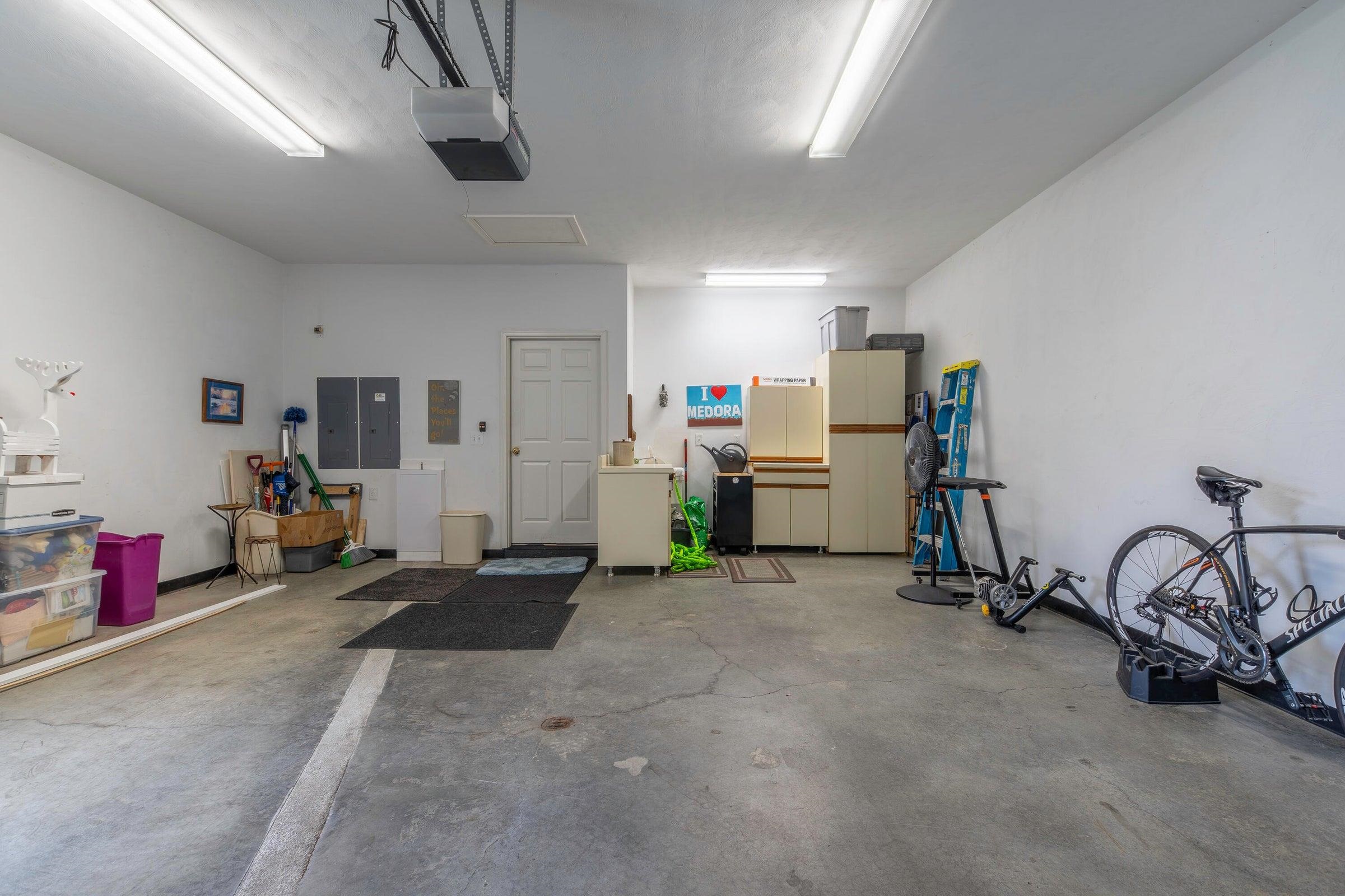 Attached garage with work space.
