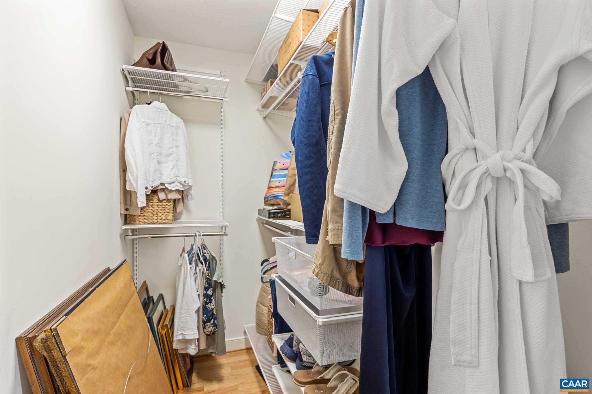 Thoughtfully designed closets throughout the home feature custom organization systems by the Container store. Thoughtfully designed closets throughout the home feature custom organization systems by the Container store.