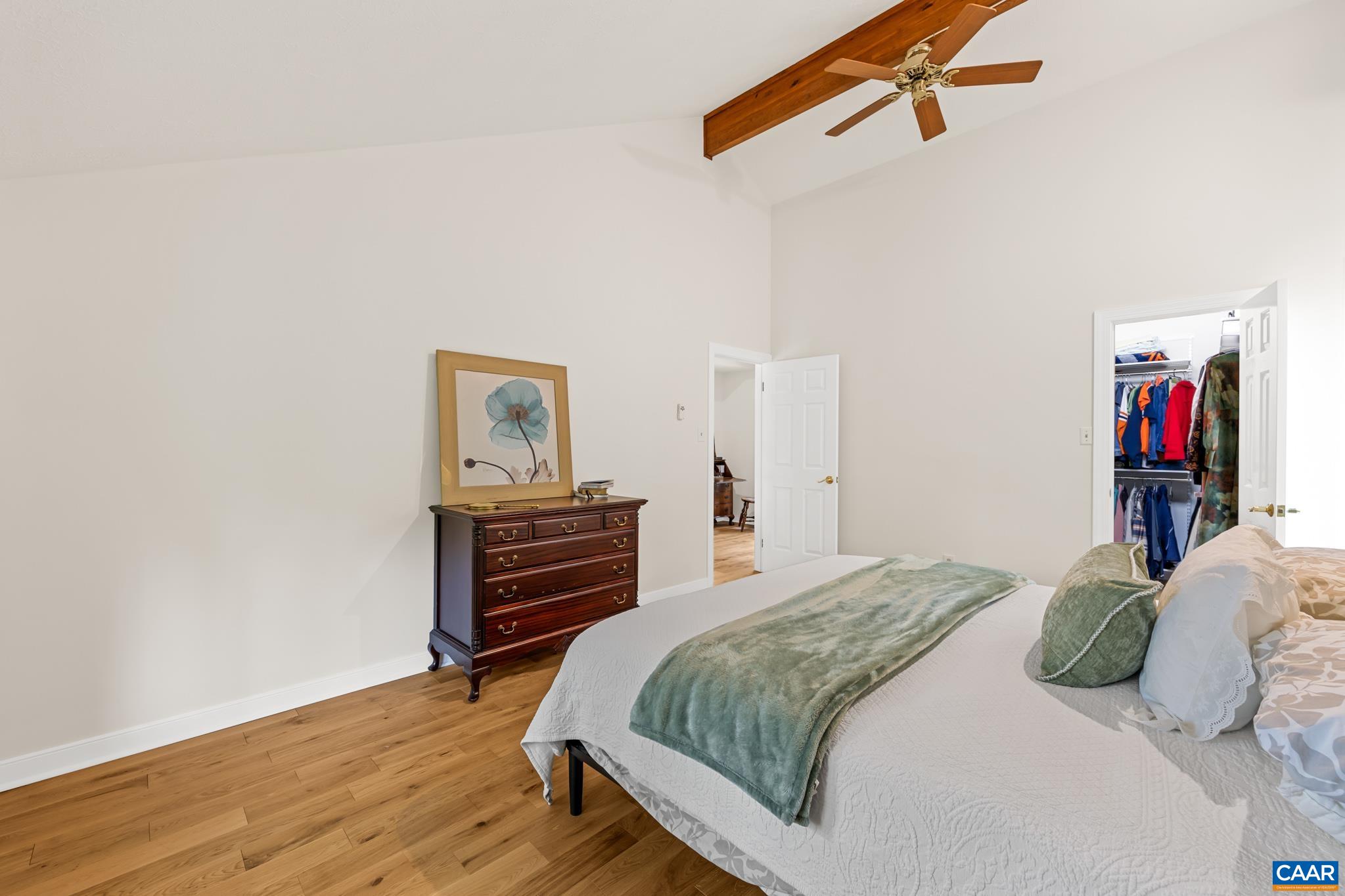 Expansive 3rd bedroom with water views, vaulted ceilings and professionally installed closet systems Expansive 3rd bedroom with water views, vaulted ceilings and professionally installed closet systems