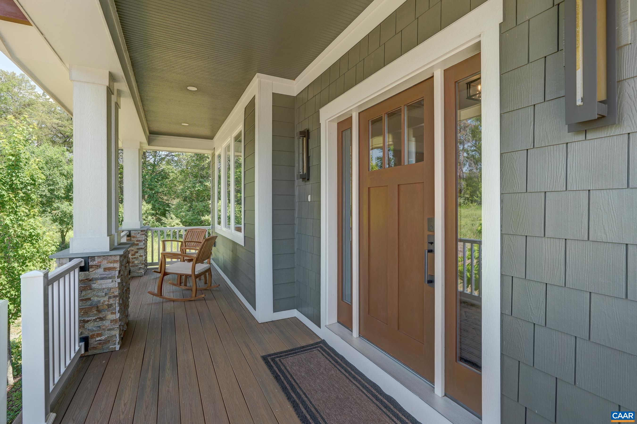 Covered front porch welcomes guests. Covered front porch welcomes guests.