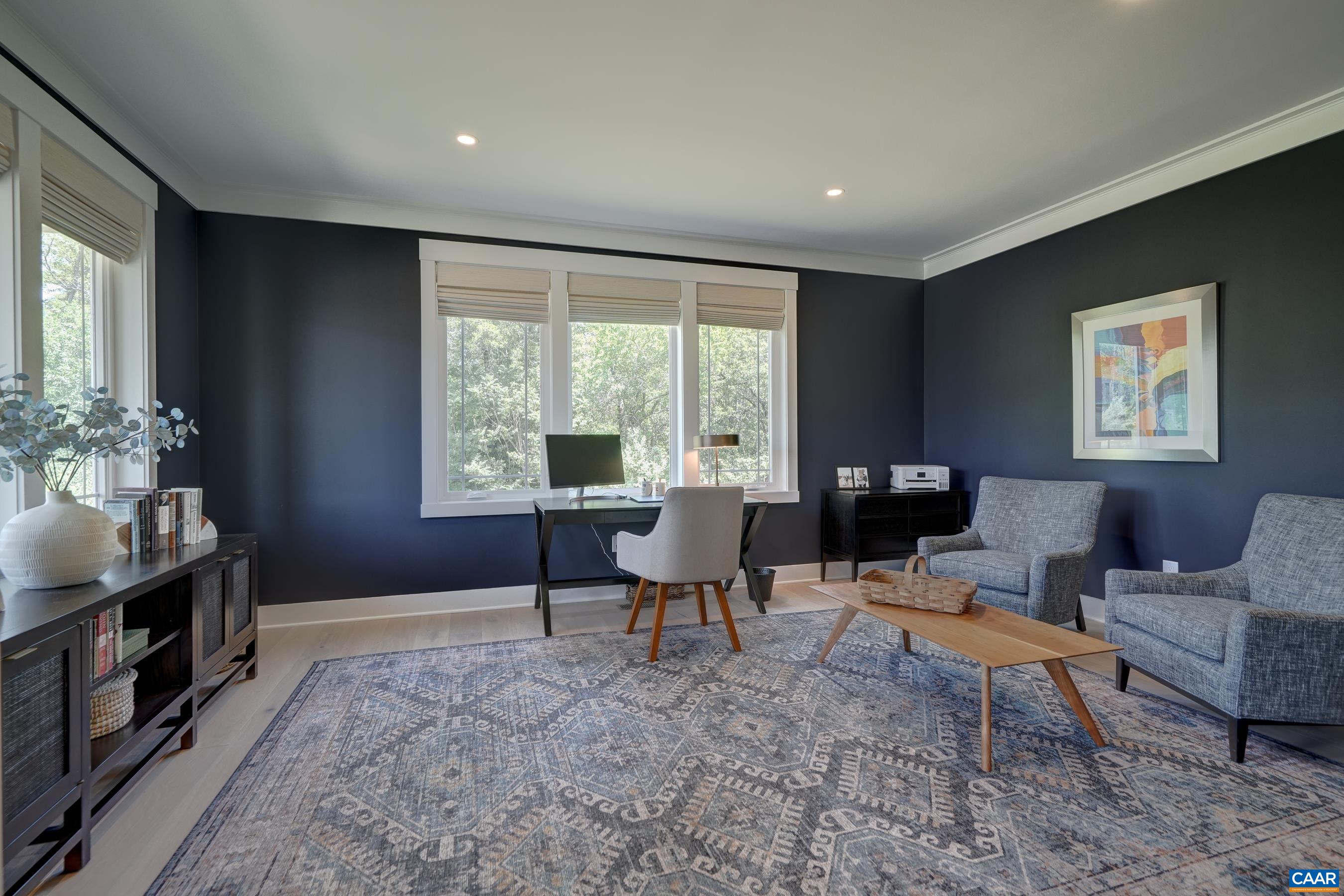 Home office with sliding pocket doors, could also be a playroom or formal living room. Home office with sliding pocket doors, could also be a playroom or formal living room.
