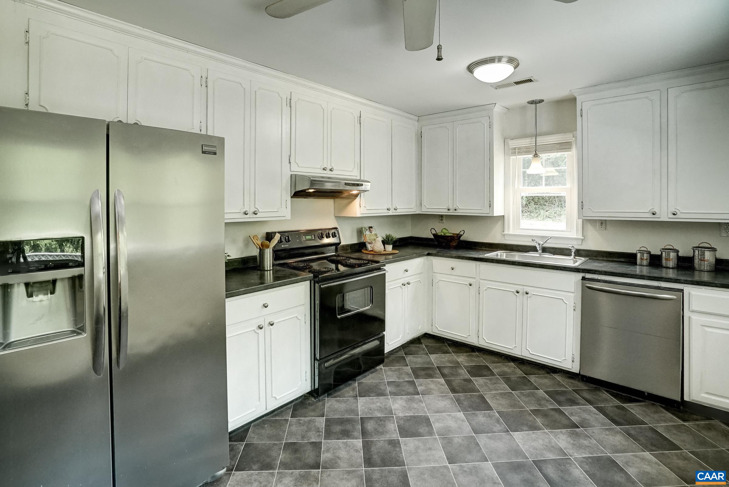 Updated kitchen features stainless refrigerator and dishwasher. Updated kitchen features stainless refrigerator and dishwasher.