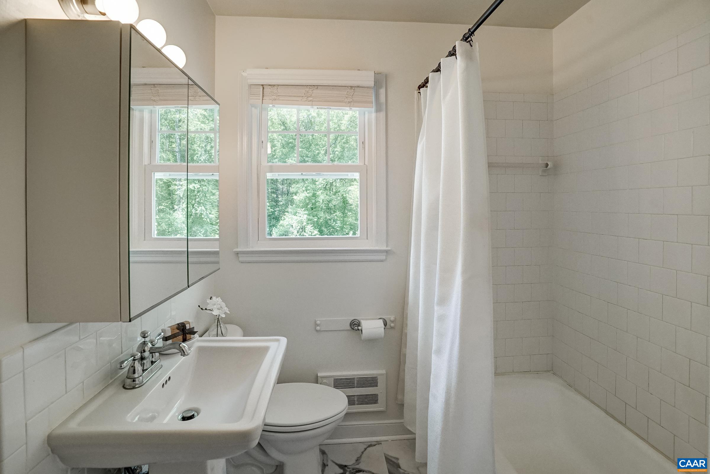 Updated full hall bathroom. Updated full hall bathroom.