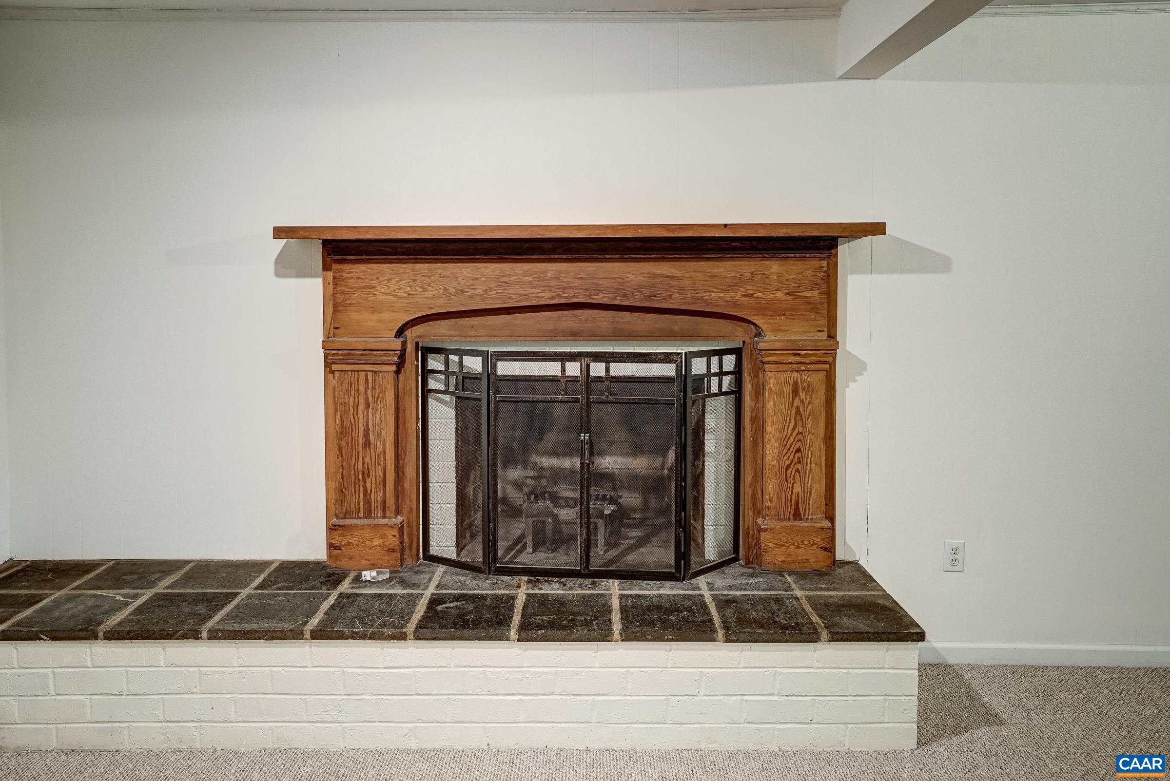 Brick woodburning fireplace. Brick woodburning fireplace.