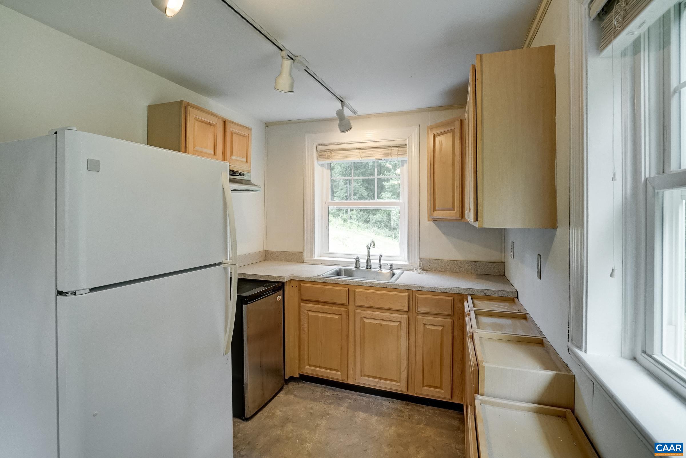 Kitchenette in basement offers future expansion possibilities. Kitchenette in basement offers future expansion possibilities.