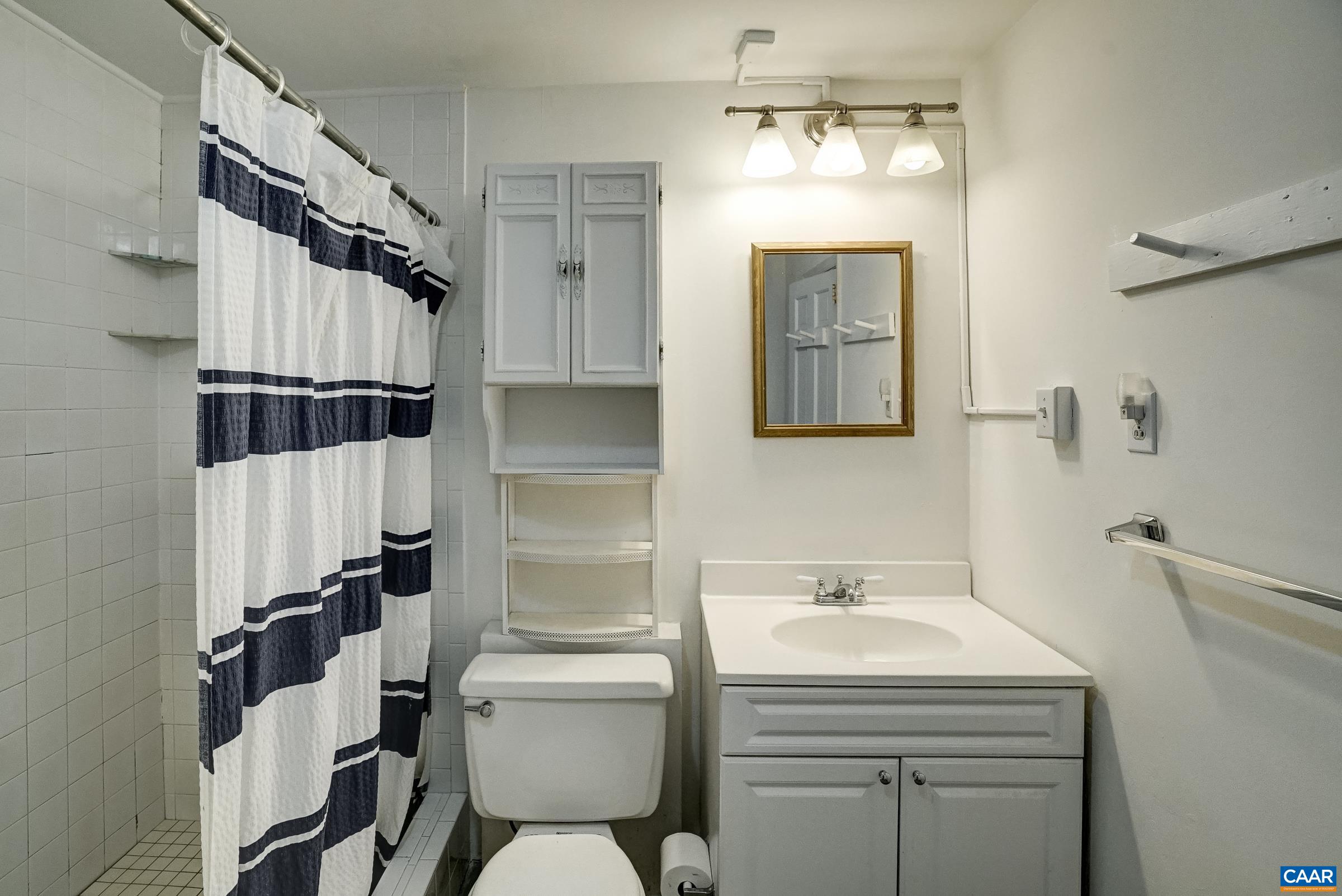 Full bathroom with shower Full bathroom with shower