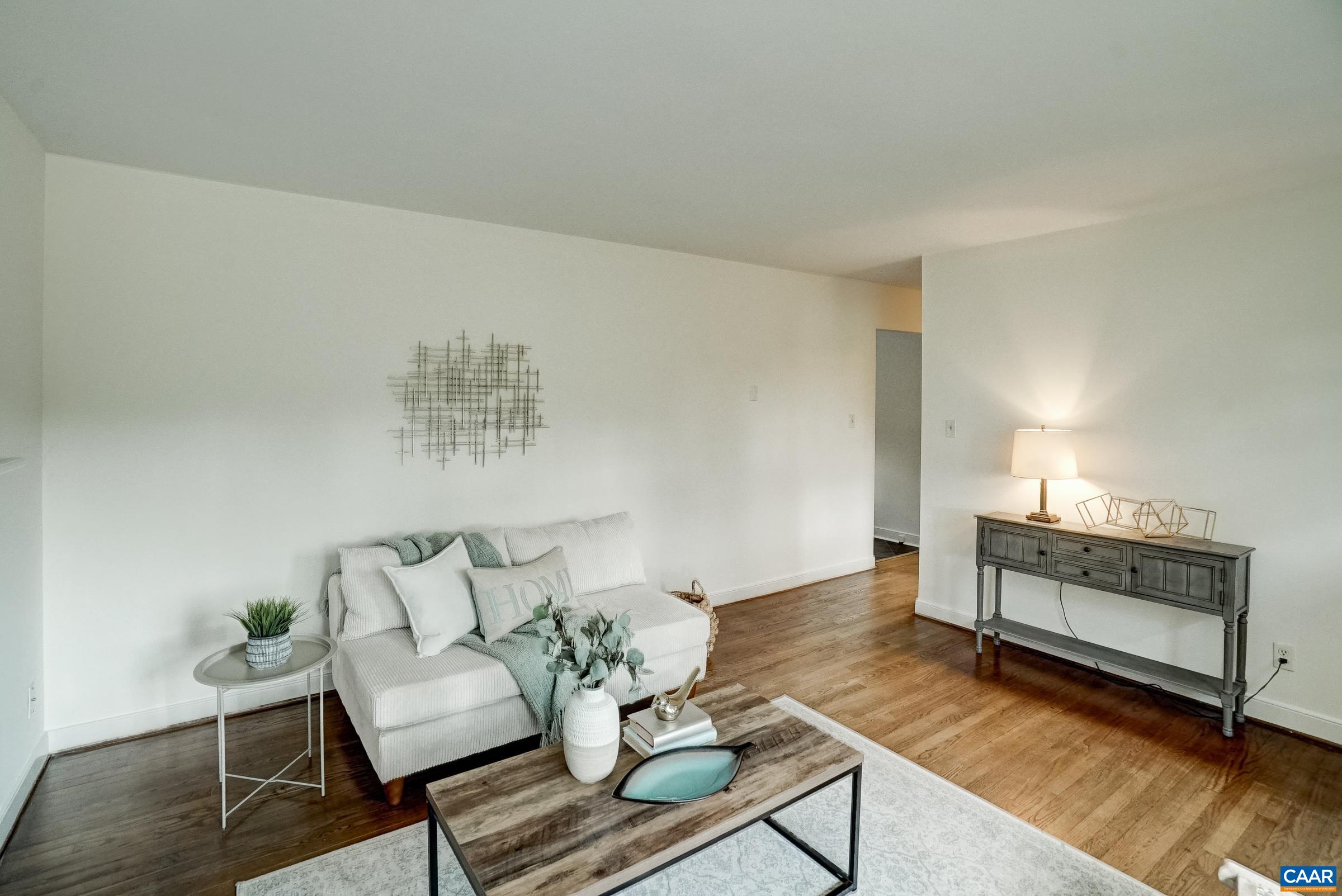 Hardwood floors in the living room and bedrooms. Hardwood floors in the living room and bedrooms.
