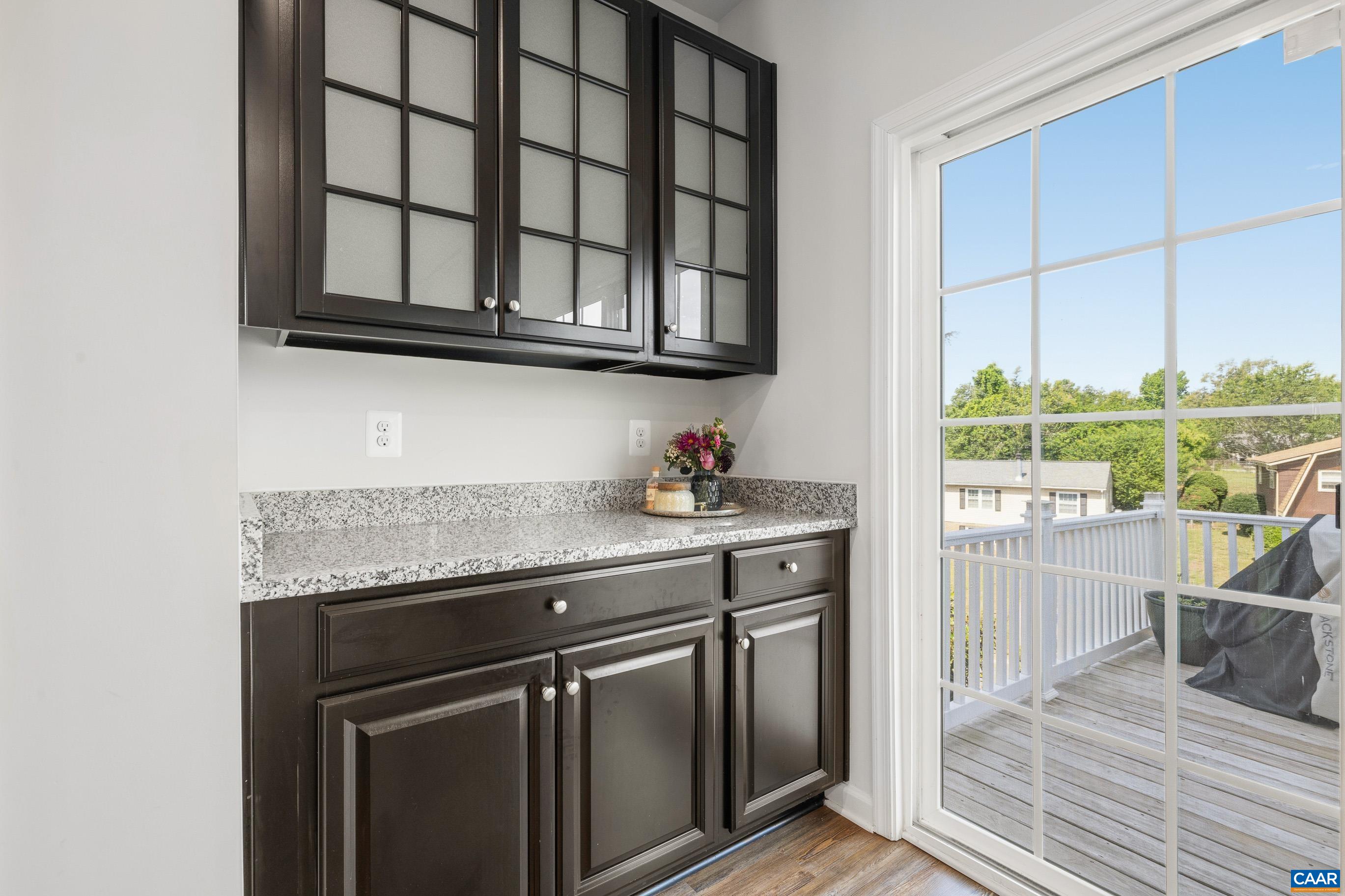 Additional cabinetry for a coffee bar that overlooks the spacious deck Additional cabinetry for a coffee bar that overlooks the spacious deck