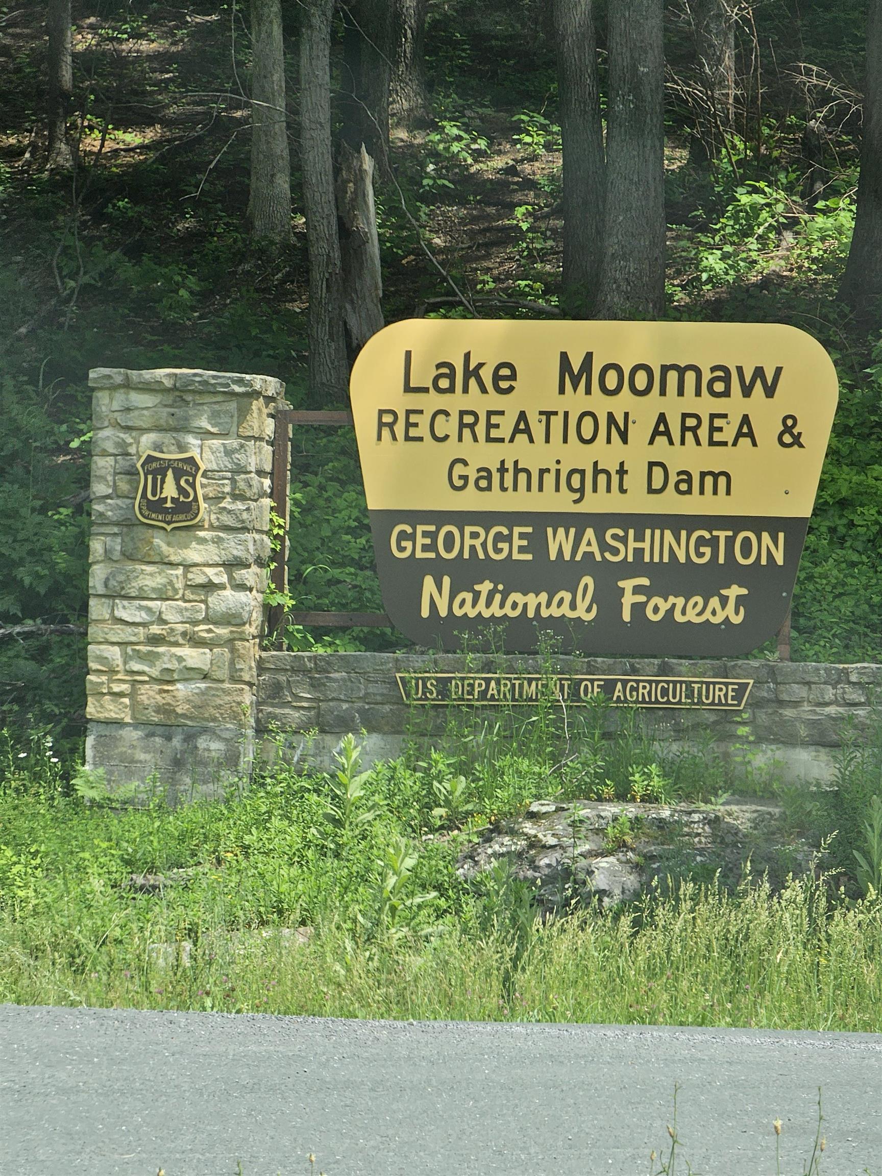 Sign is 1 mile north from the property. Turn left at stop sign to Gathright Dam and a boat landing for Lake Moomaw or go to your right to go up to Lake Moomaw on Coles Point Rd.