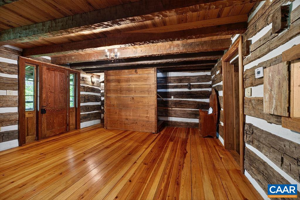 The charming heart pine floors on the main and upper level were brought from South Carolina old-growth forest salvaged after Hurricane Hugo. The charming heart pine floors on the main and upper level were brought from South Carolina old-growth forest salvaged after Hurricane Hugo.