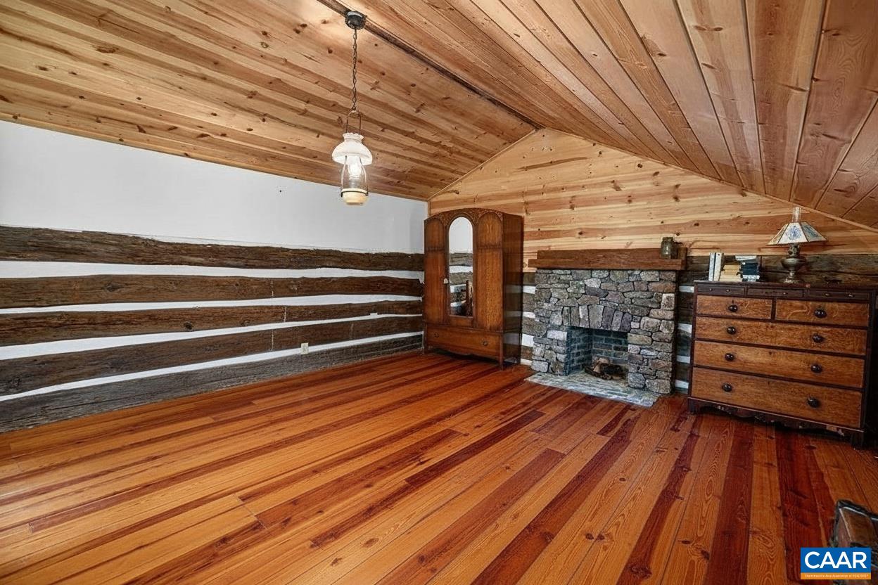 Upstairs primary suite offers a wood burning fireplace. Upstairs primary suite offers a wood burning fireplace.