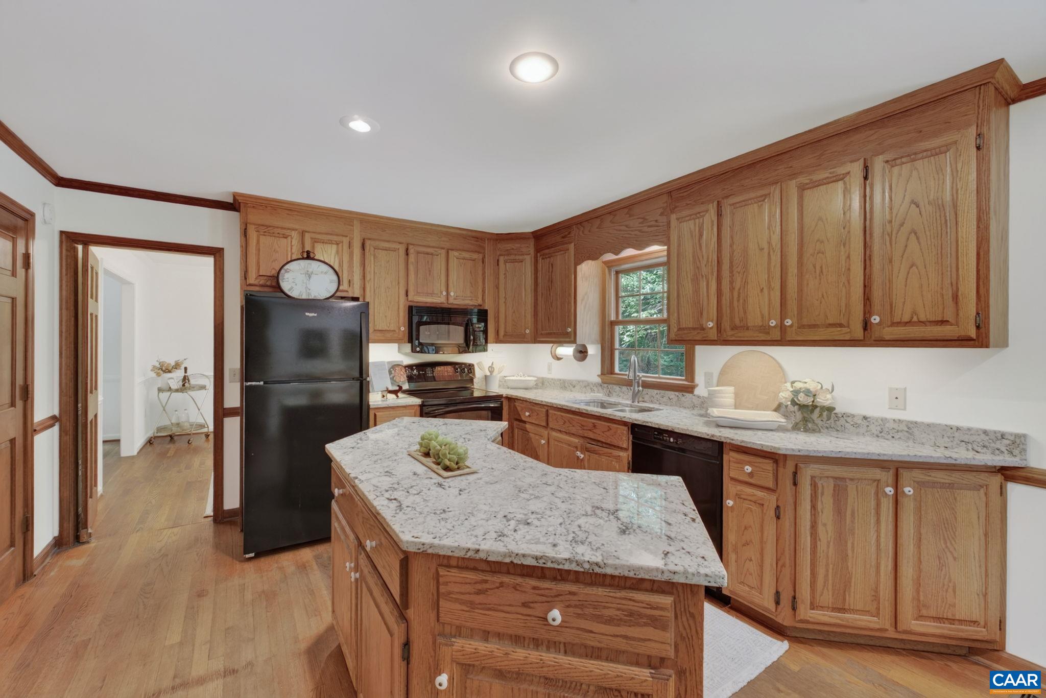 Granite counters throughout the kitchen.