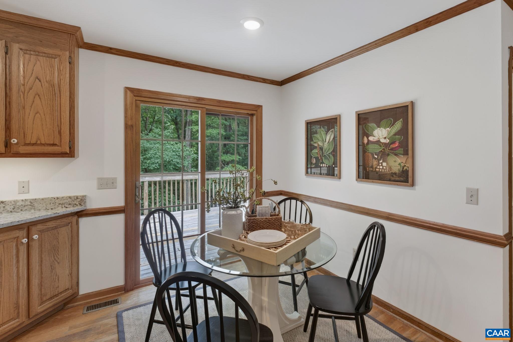 Cozy breakfast nook leads to the back deck.