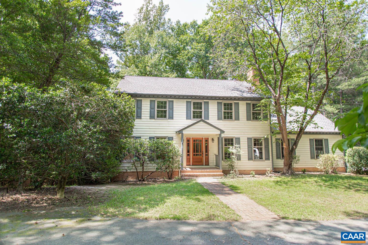 Sitting on 2.46 wooded acres in the Whippoorwill Hollow neighborhood.