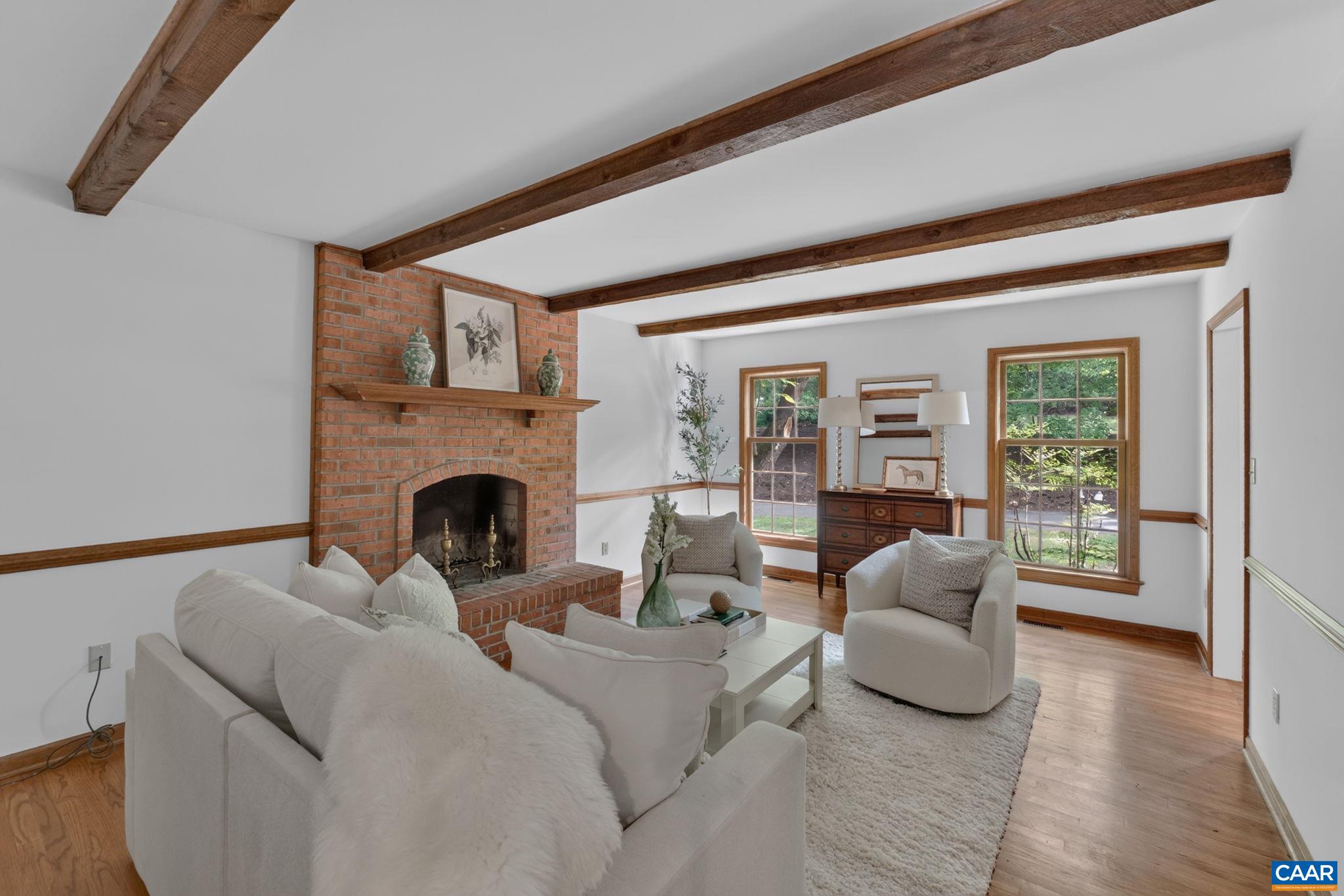 From the kitchen, enter the cozy den.