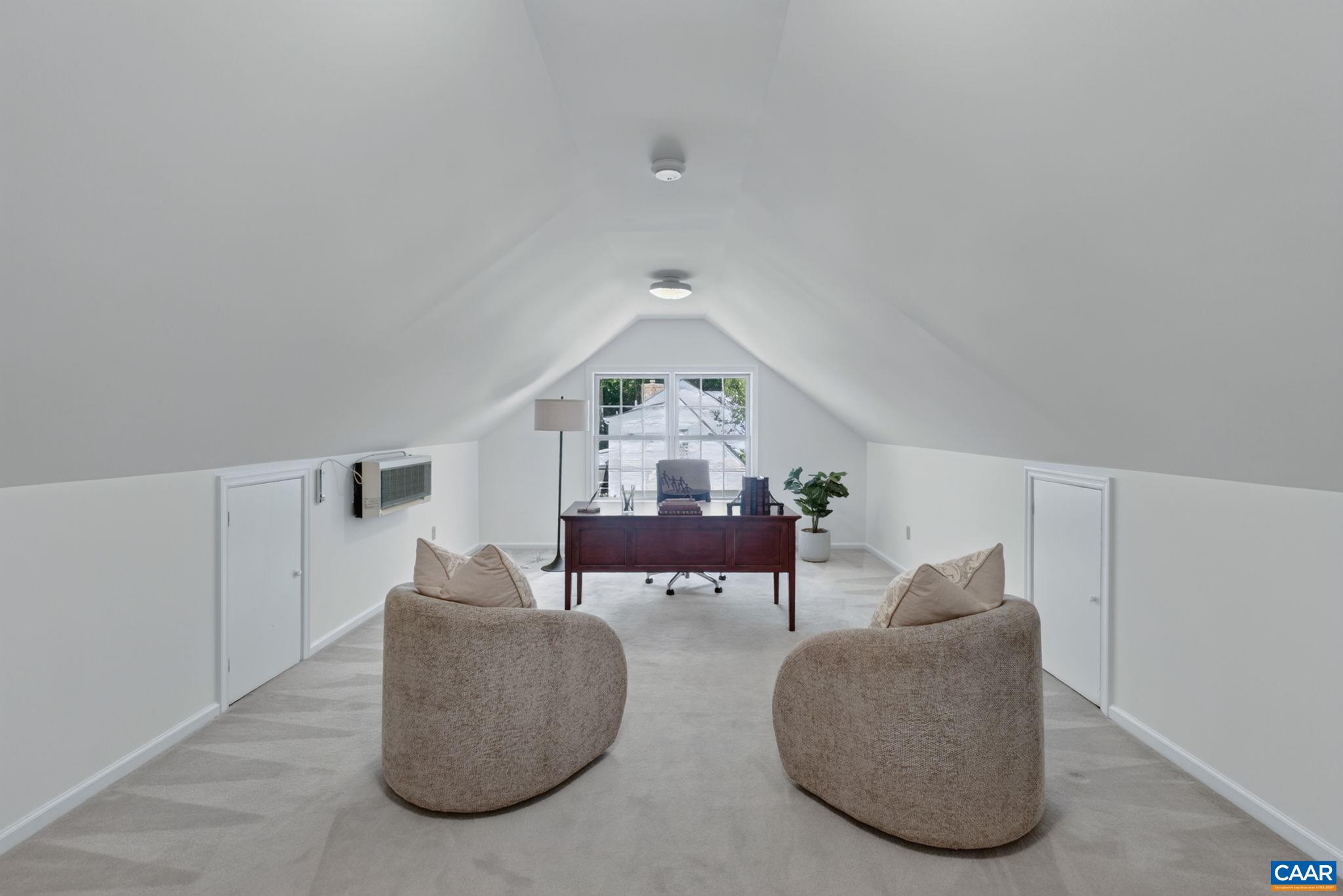Spacious bonus room, ideal for a home office, hobbies, play, or fitness.