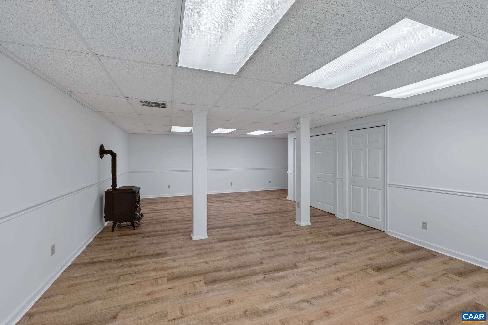 Rec room includes a pellet stove but it will need to be professionally reinstalled.