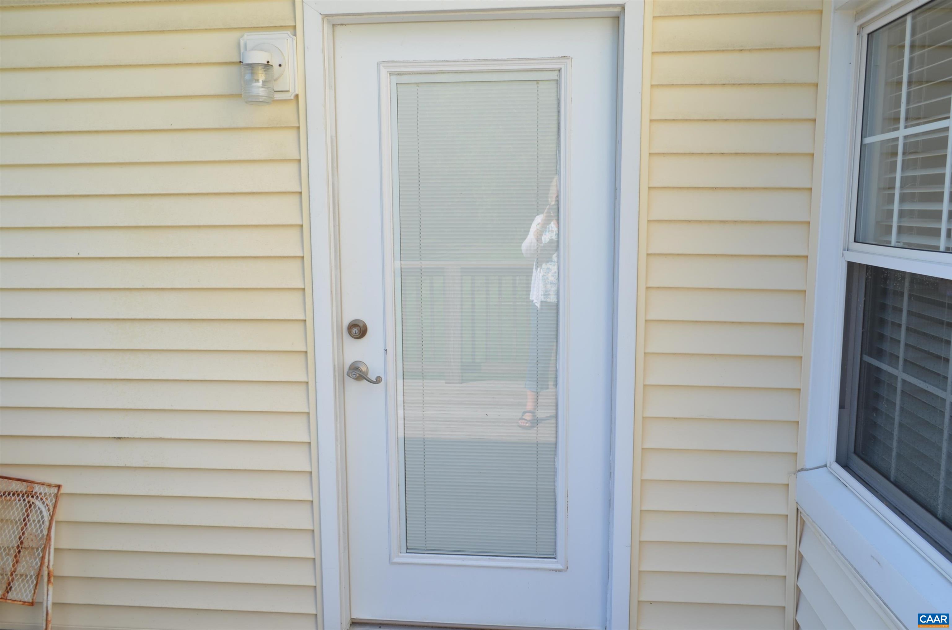 Door leads into Front Parlor from side deck