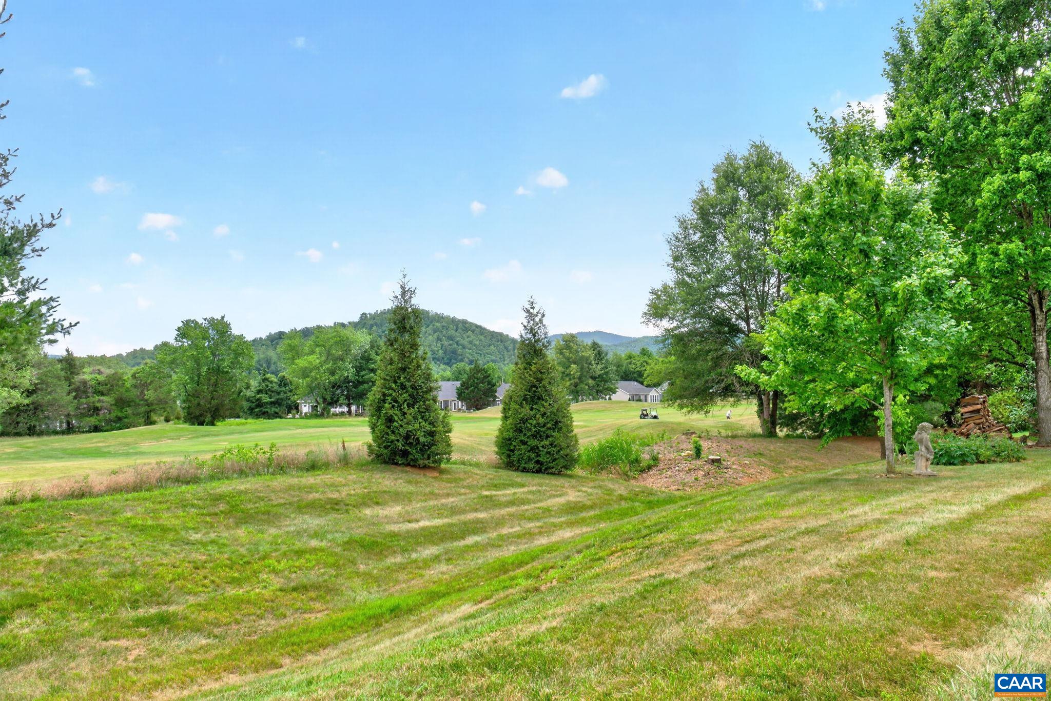 Backyard overlooks Tuckahoe 9th hole.