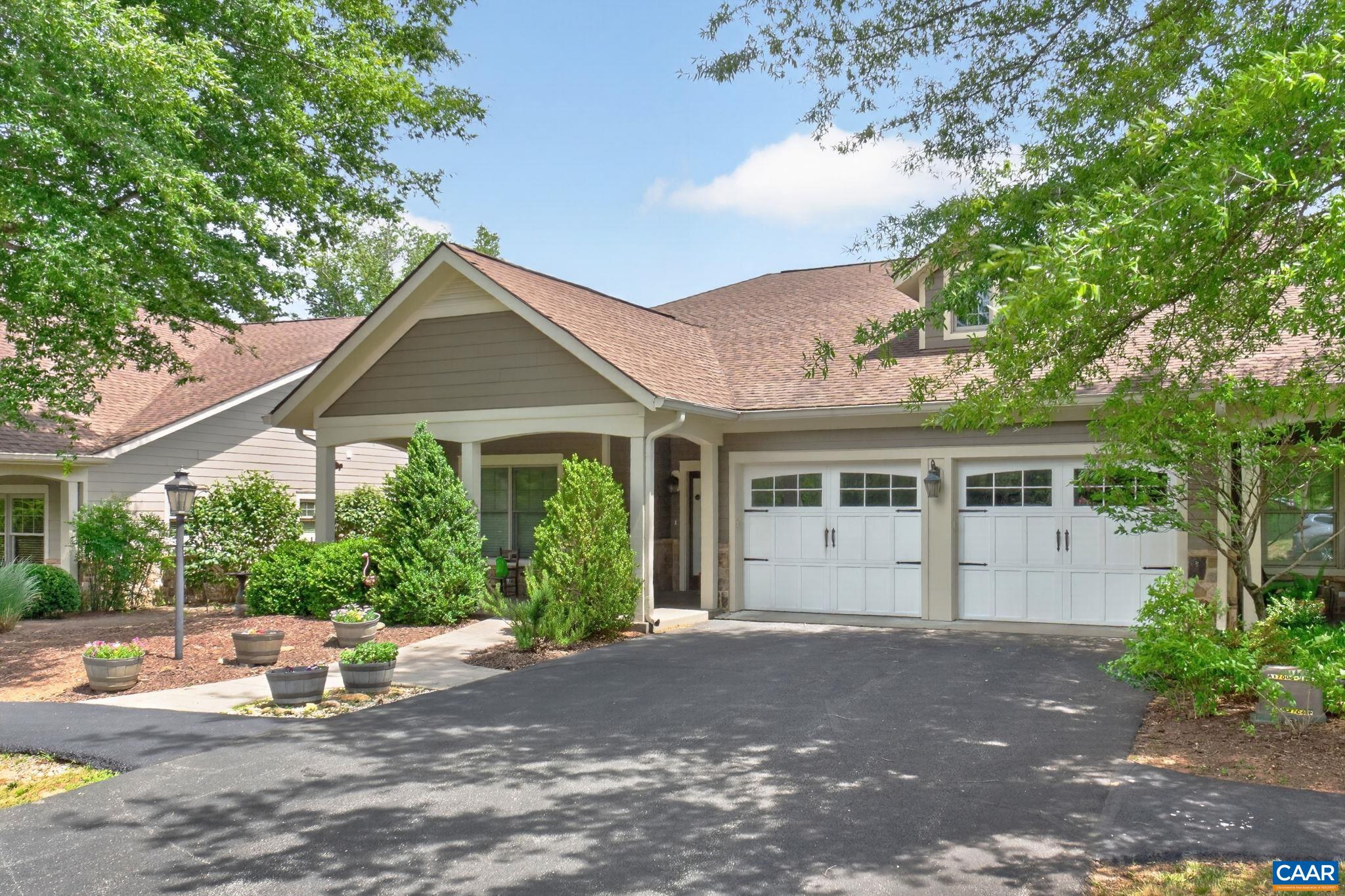 Paved drive and large 2 car garage.