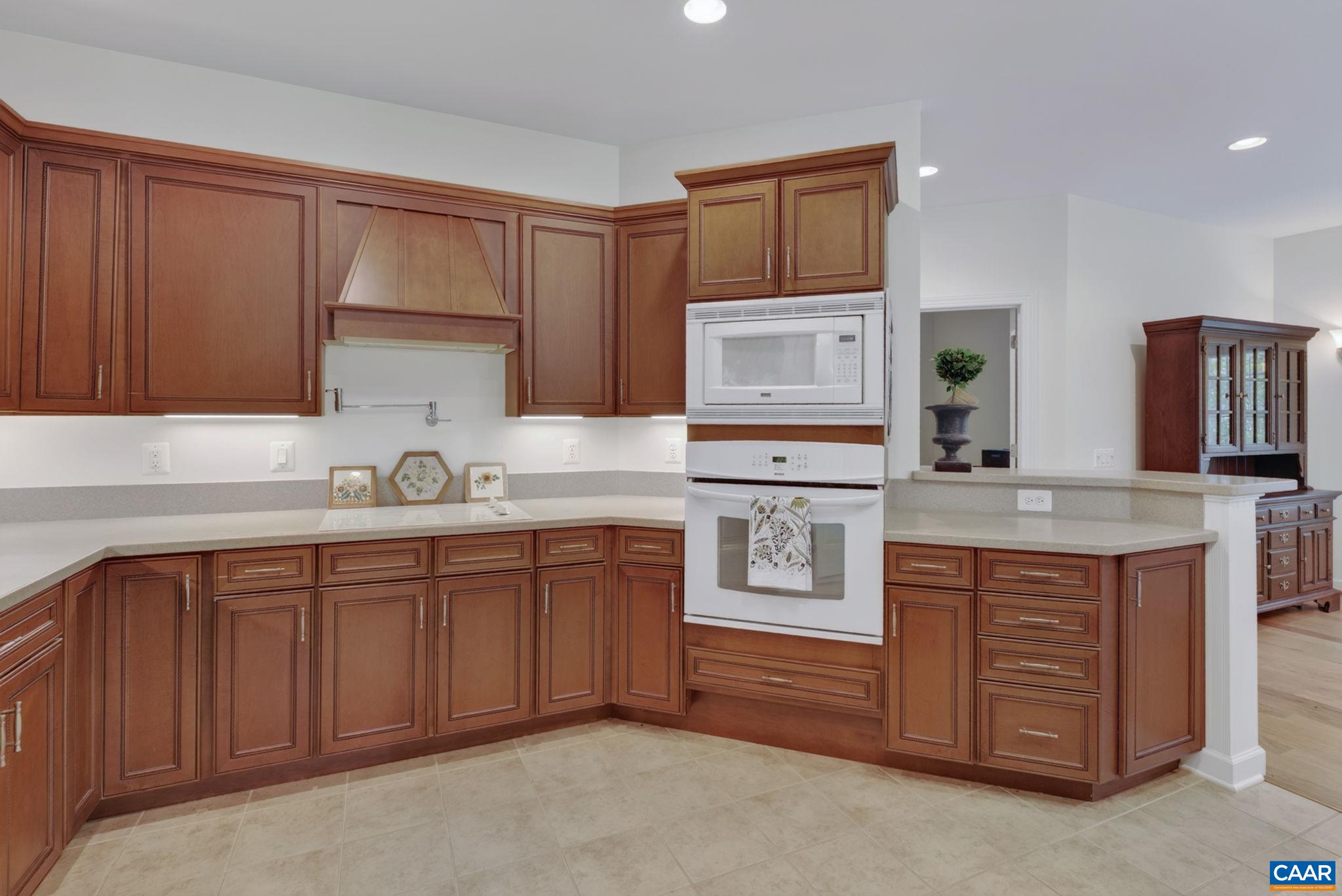 Electric cooktop and wall oven/microwave.