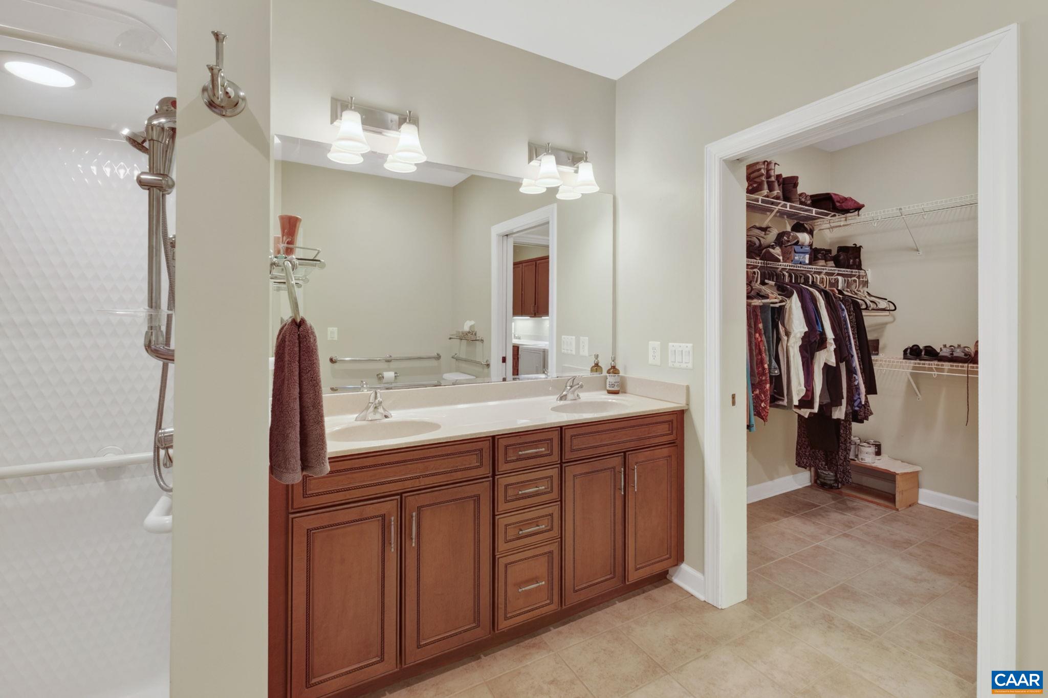 Primary bath with additional walk-in closet.