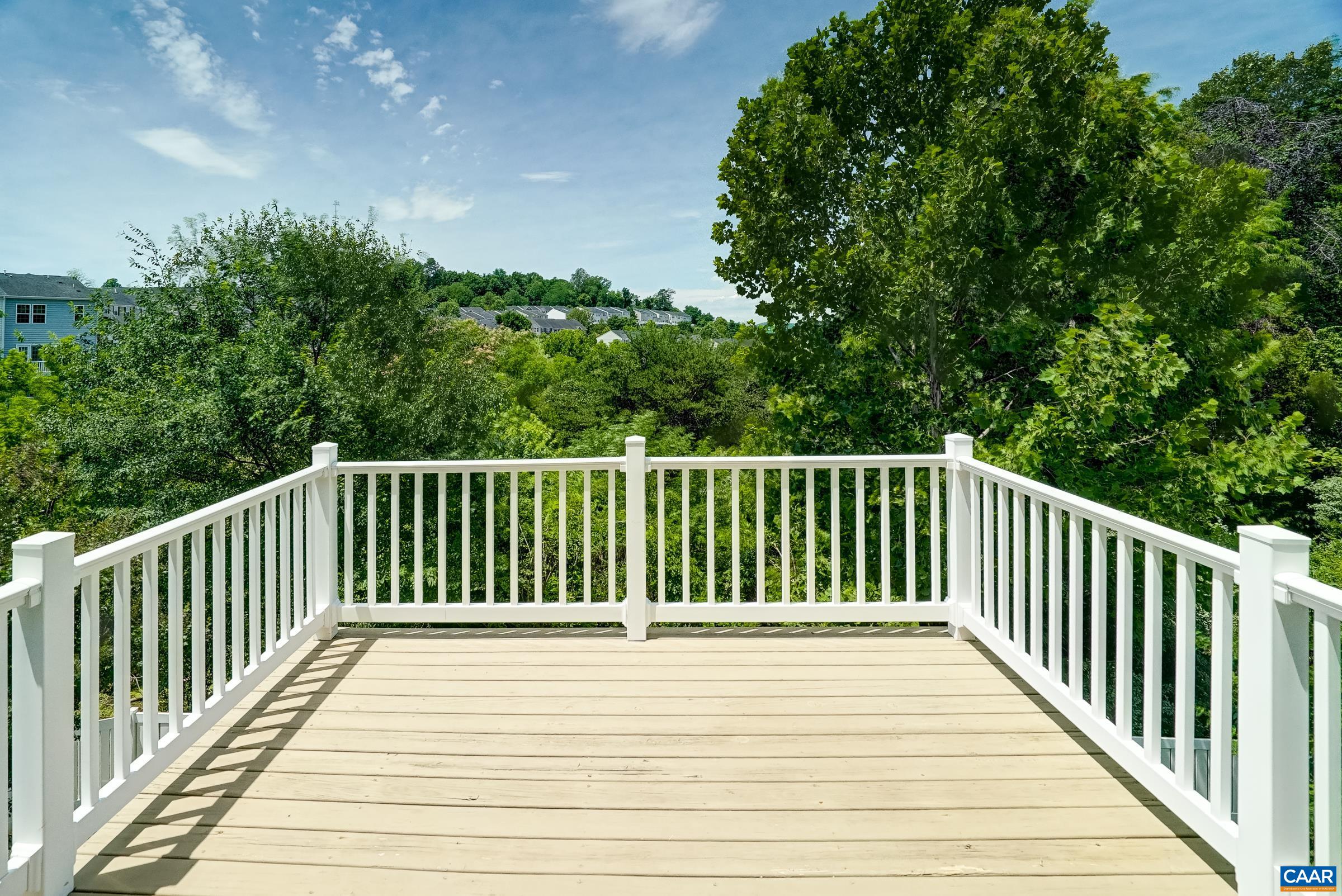 Enjoy outdoor dining and grilling on the beautiful deck.