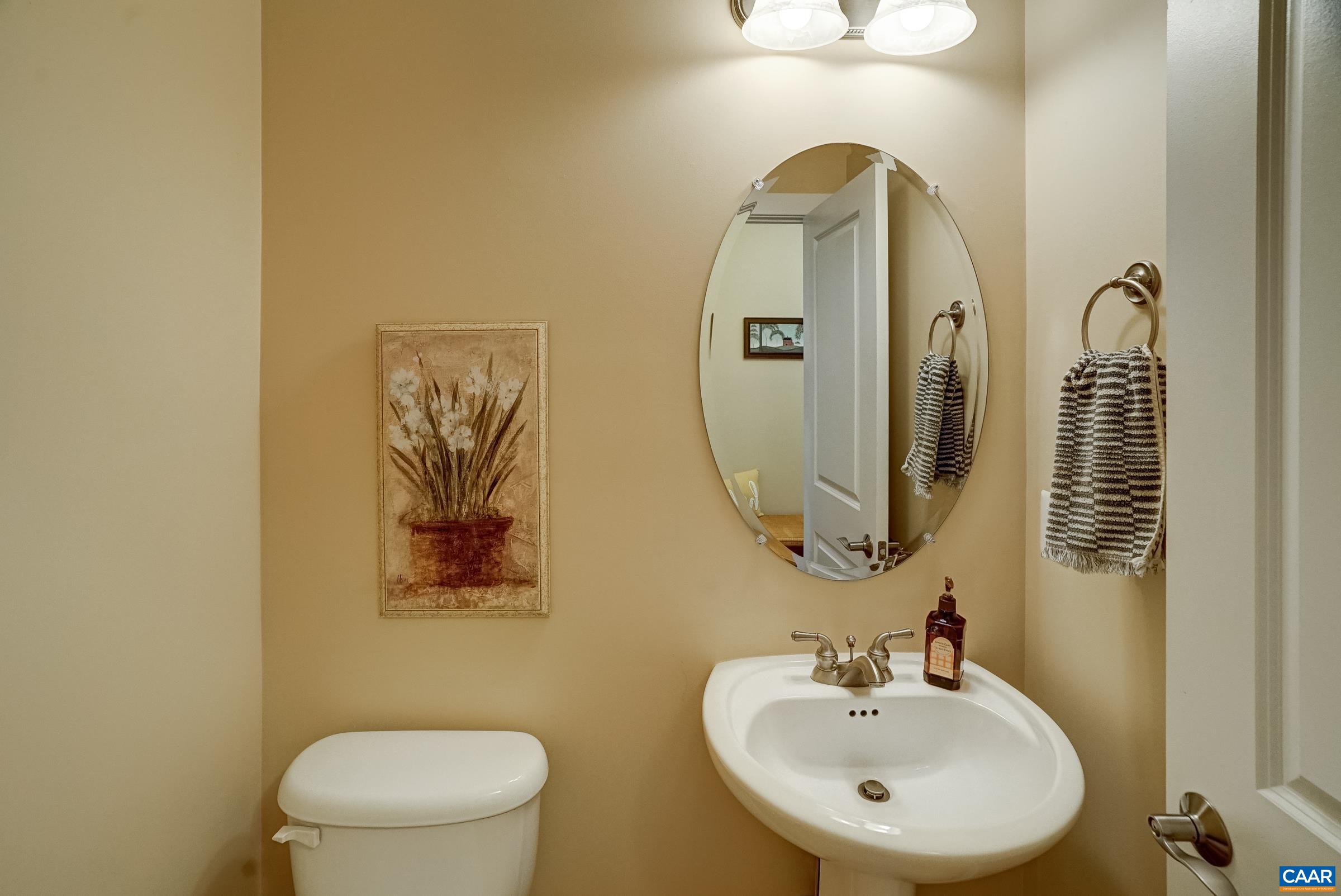 Powder room with pedestal sink.