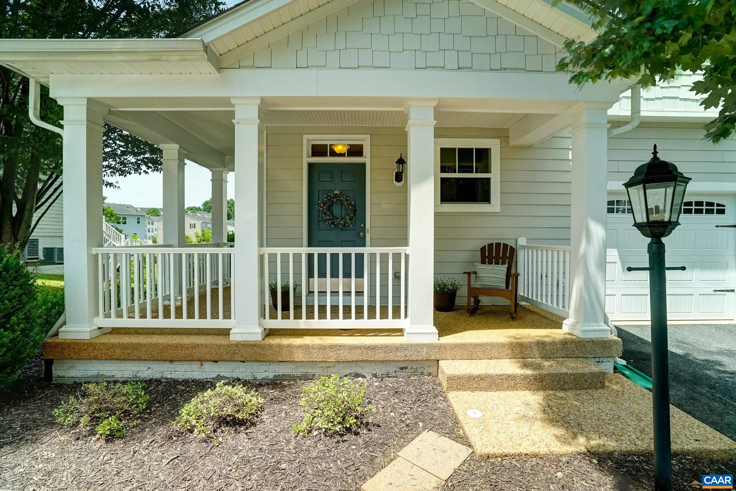 Wrap around front porch and one car garage!
