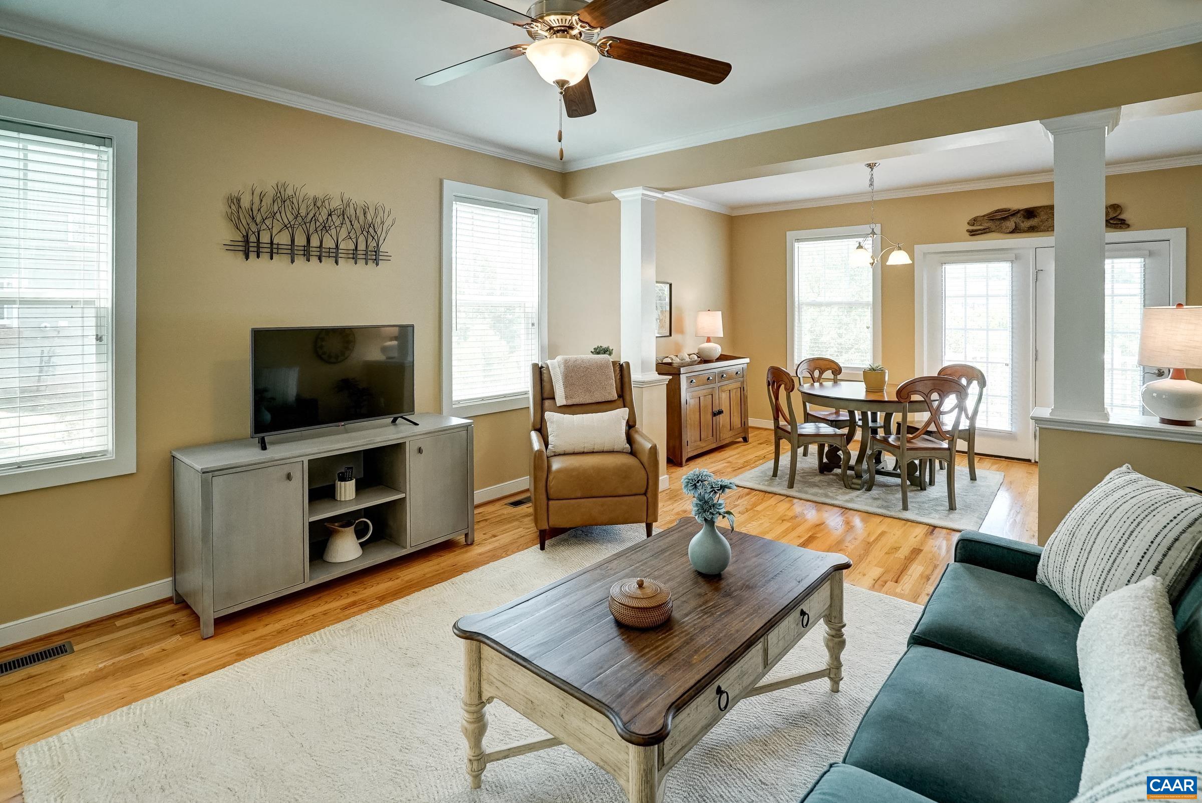 Living room with ceiling fan.