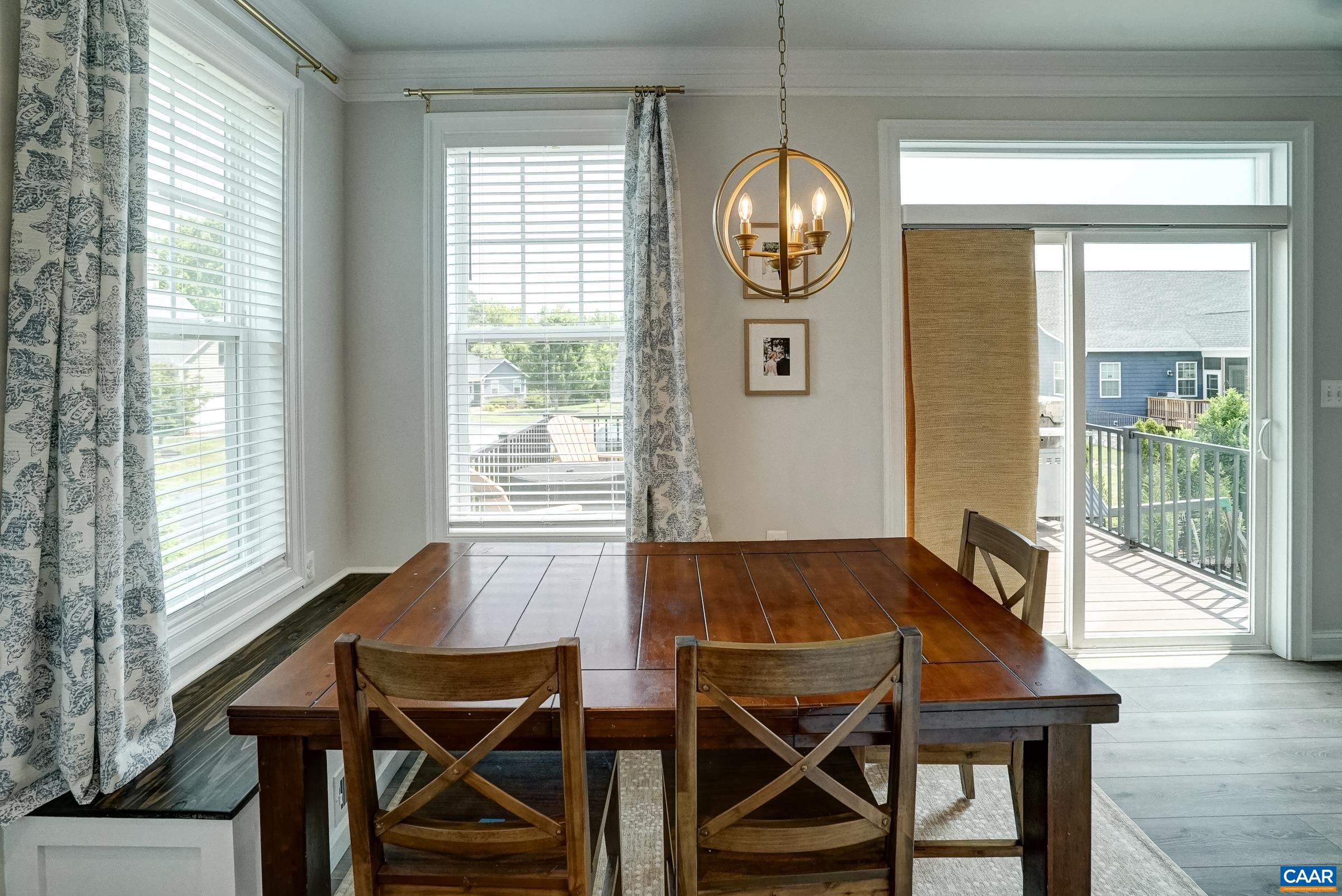 Dining area features built-in banquette seating.