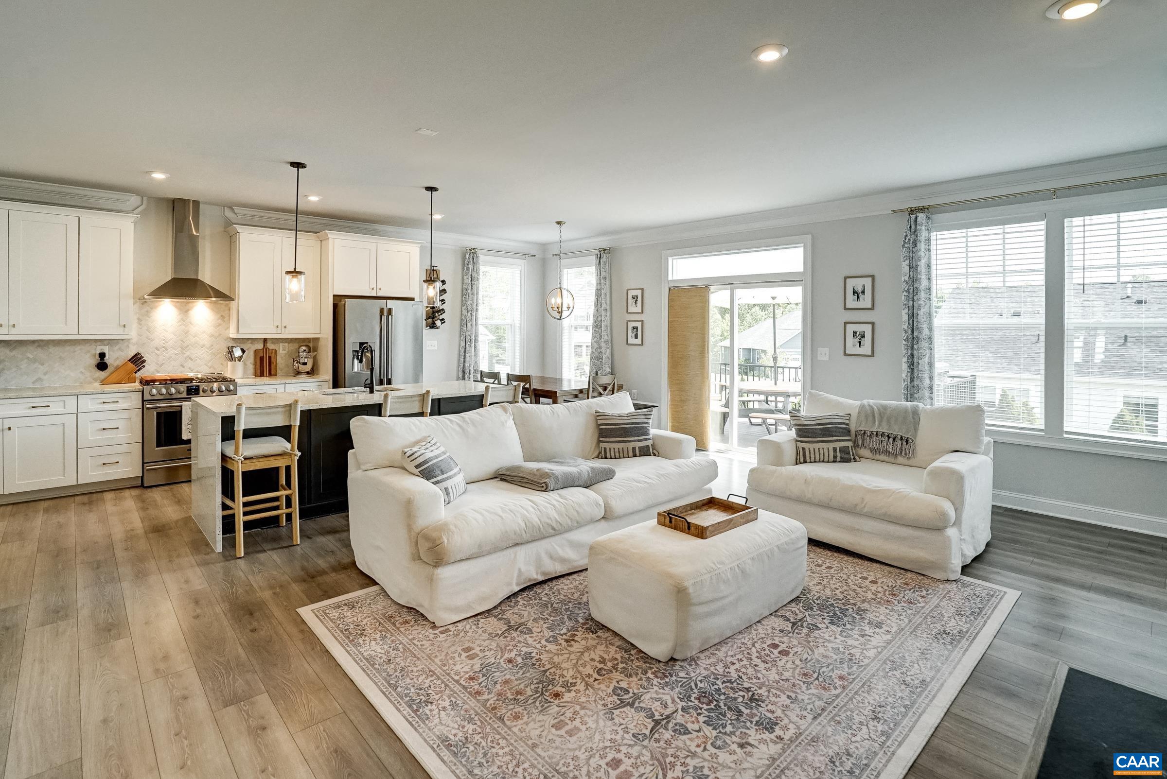 Sunny great room opens to the gourmet kitchen.