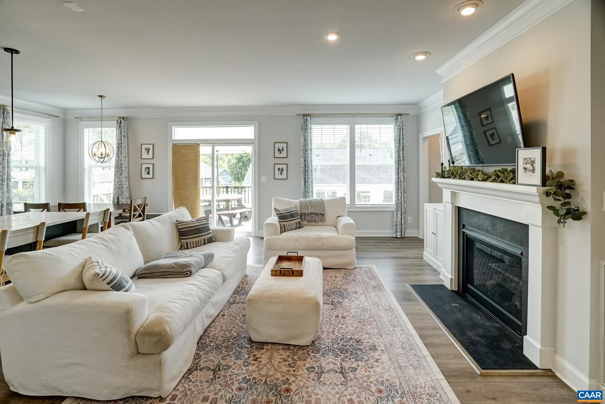Gas fireplace with built in storage and floating shelves.