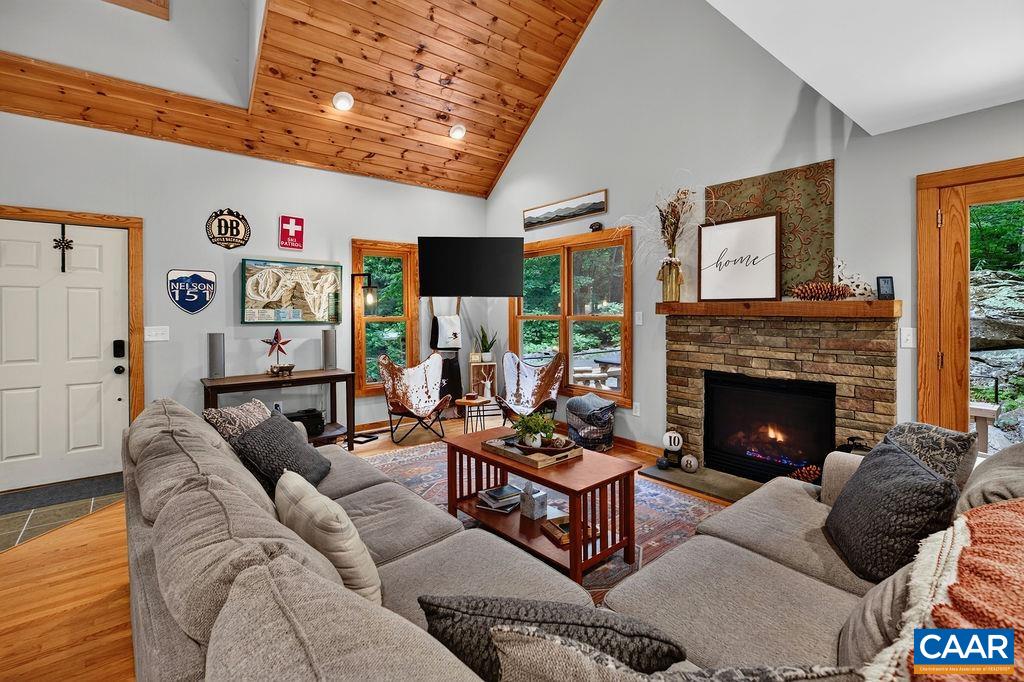 Thoughtfully designed open floor plan with cathedral ceilings in the great room, adding a sense of space and mountain charm.