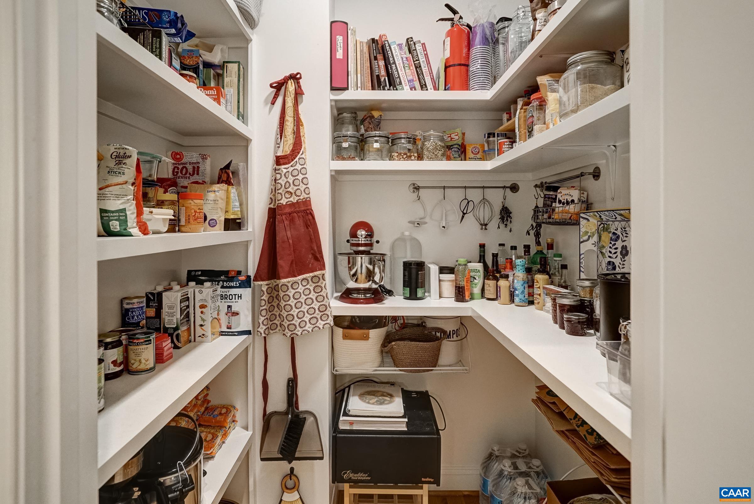 Counter height shelving offers space for small appliances.