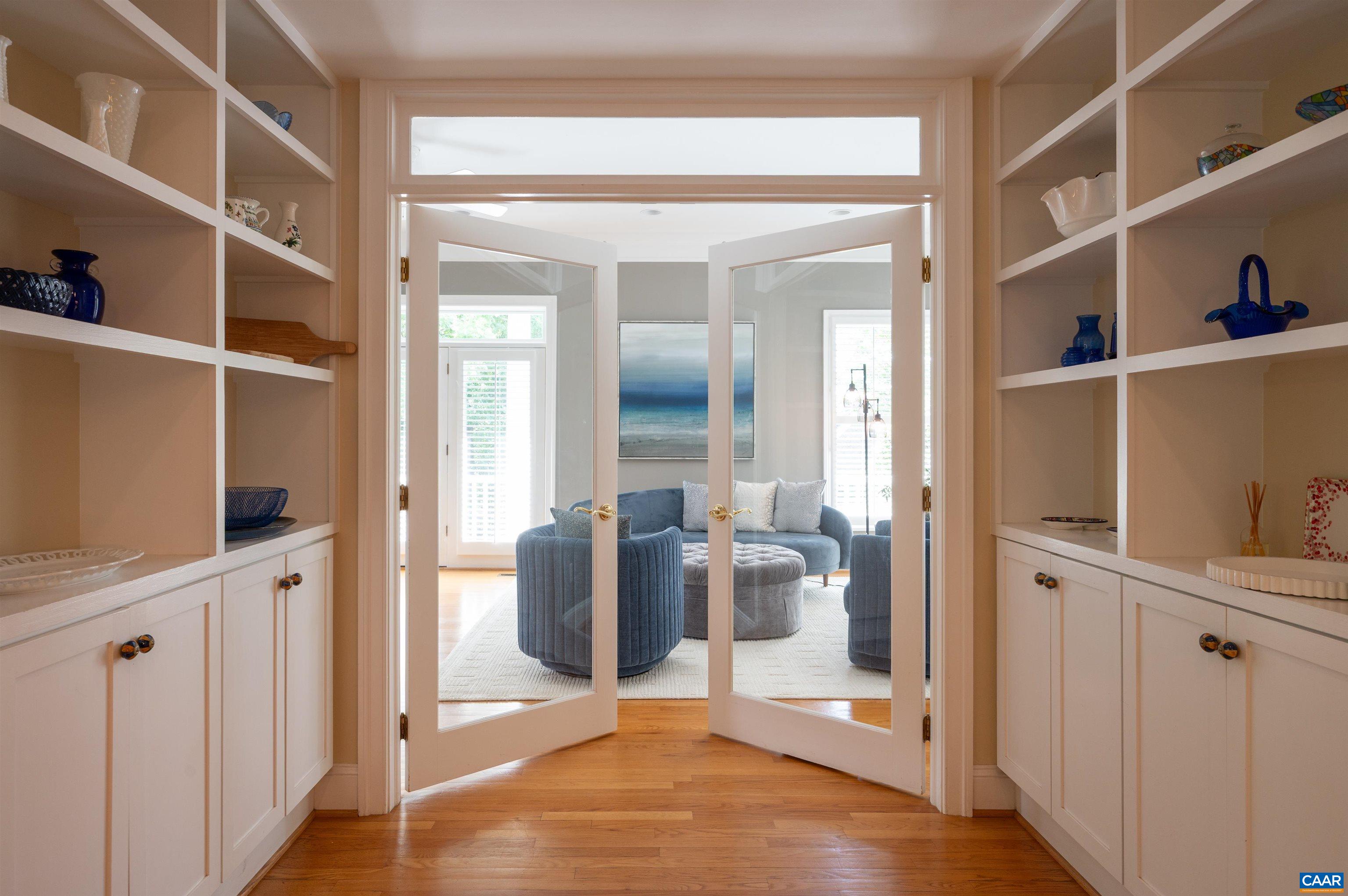 Double glass doors lead into the gathering room with access the front porch. Natural sunlight is uninterrupted into the kirtchen