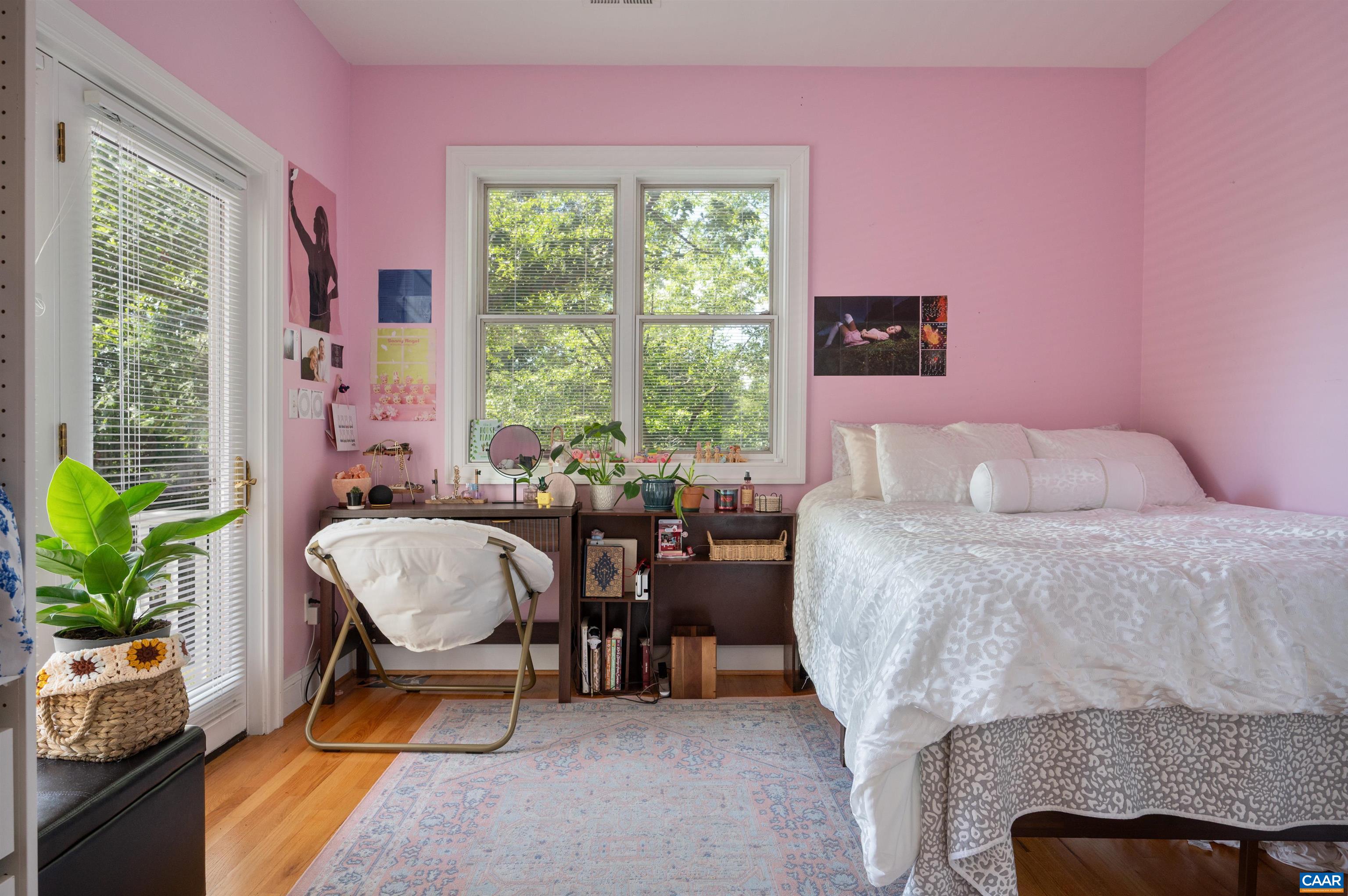 This front bedroom has a balcony.