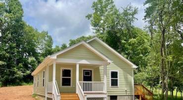 The home will be similar to the photo, the exterior of the home color is a neutral light almond color.