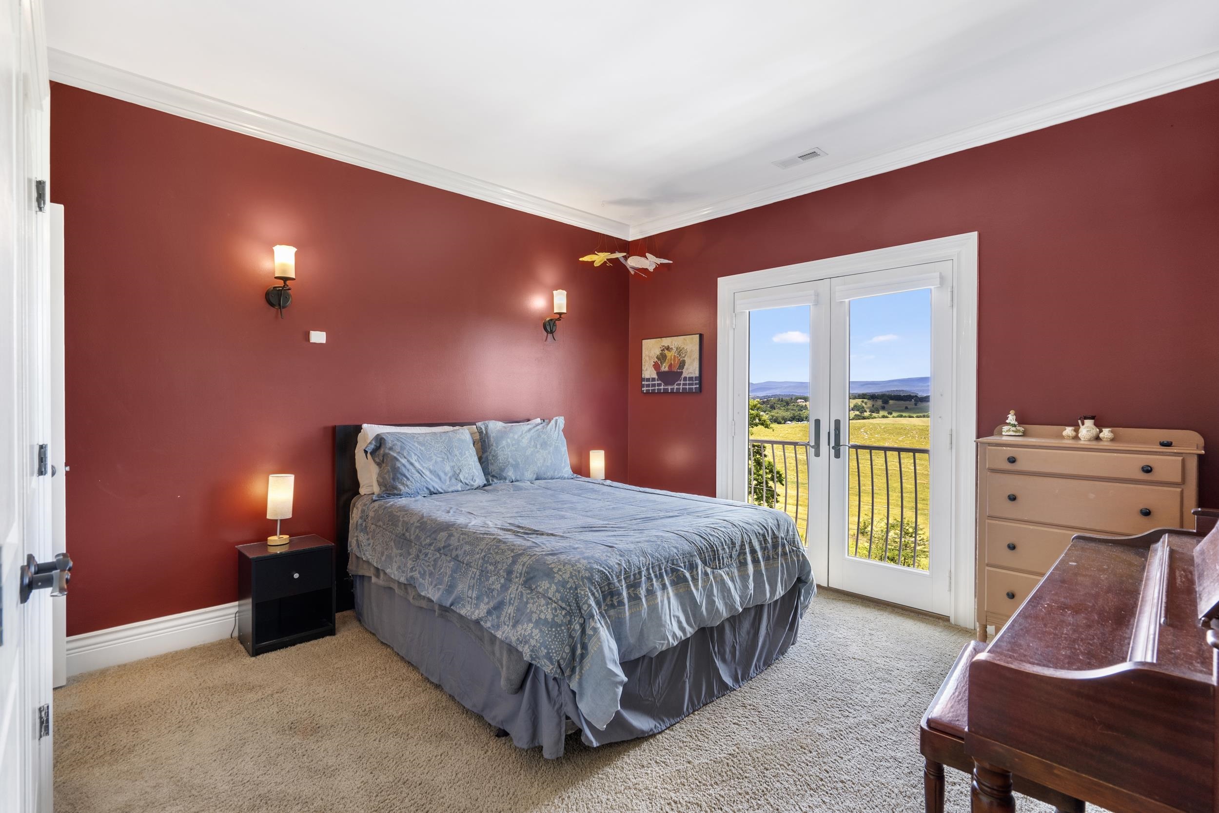 This bedroom has its own juliet balcony to enjoy western mountain views and sunsets plus its own personal full bathroom. This bedroom has its own juliet balcony to enjoy western mountain views and sunsets plus its own personal full bathroom.
