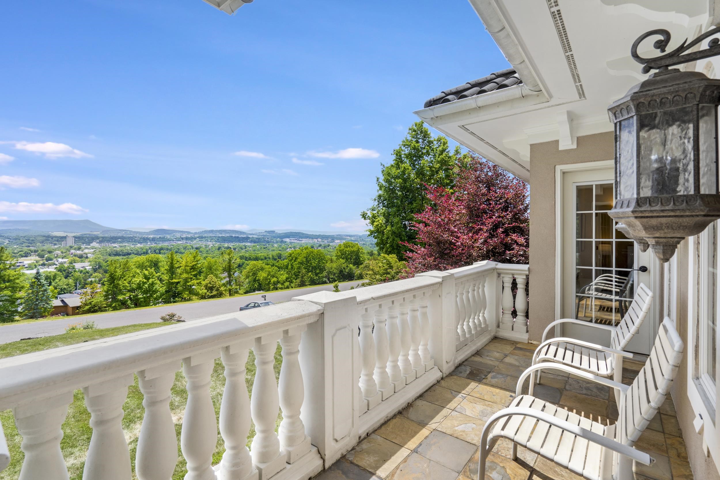 This balcony shared by bedrooms 3 & 4 with their own private entrance, looks toward the east. Watch sunrises or see the night lights as in the other photo This balcony shared by bedrooms 3 & 4 with their own private entrance, looks toward the east. Watch sunrises or see the night lights as in the other photo