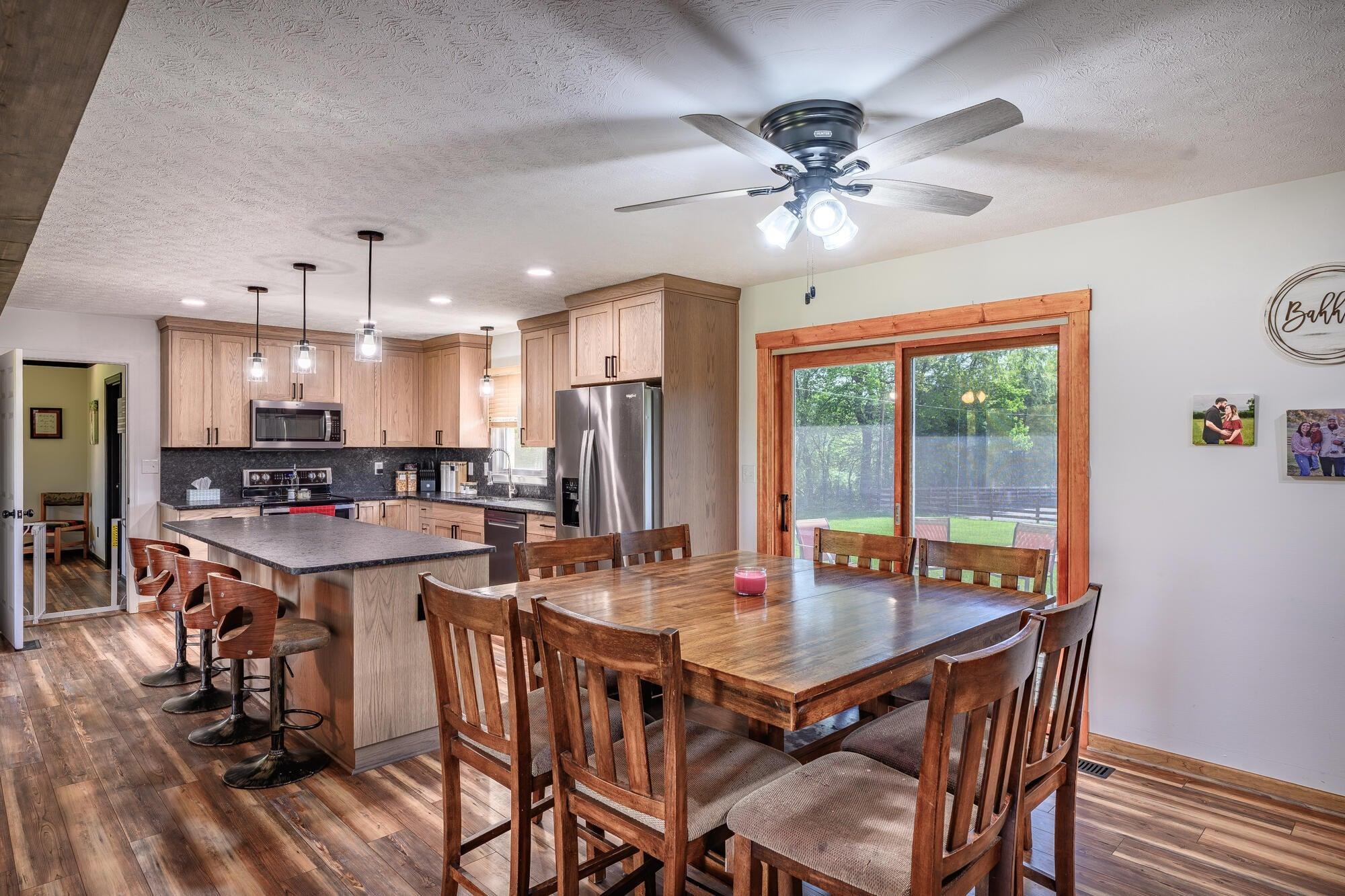 Renovation included opening the kitchen, dining and living areas into a bright, open-concept layout.
