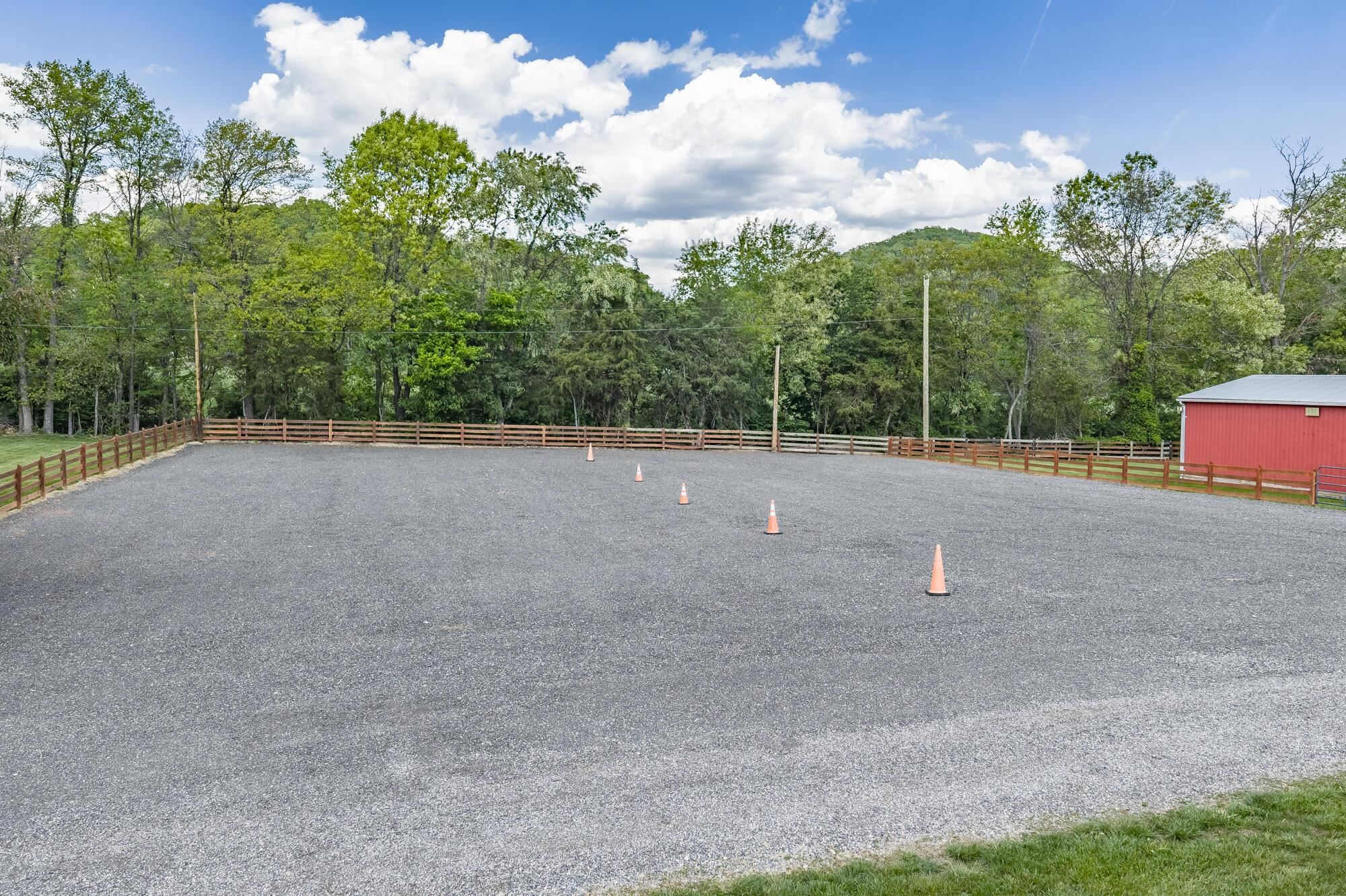 Designated parking area holds 80-90 (+/-) cars plus the field for overflow