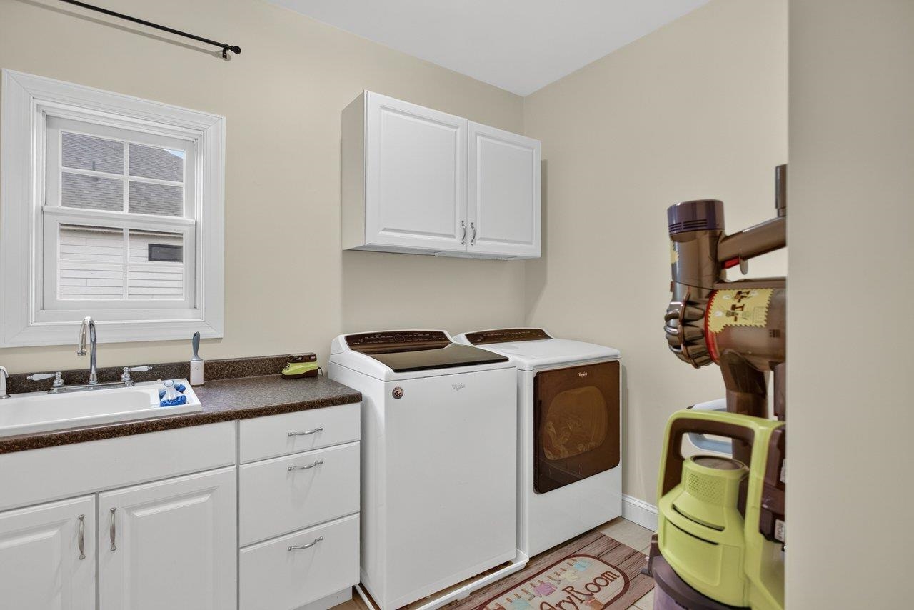 *laundry sink *cabinets *tile floors