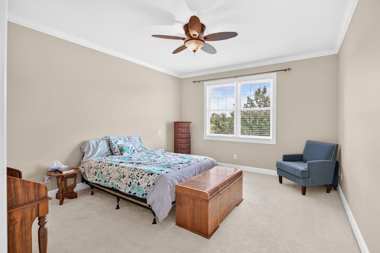 *carpet *ceiling fan *private bath and dressing area