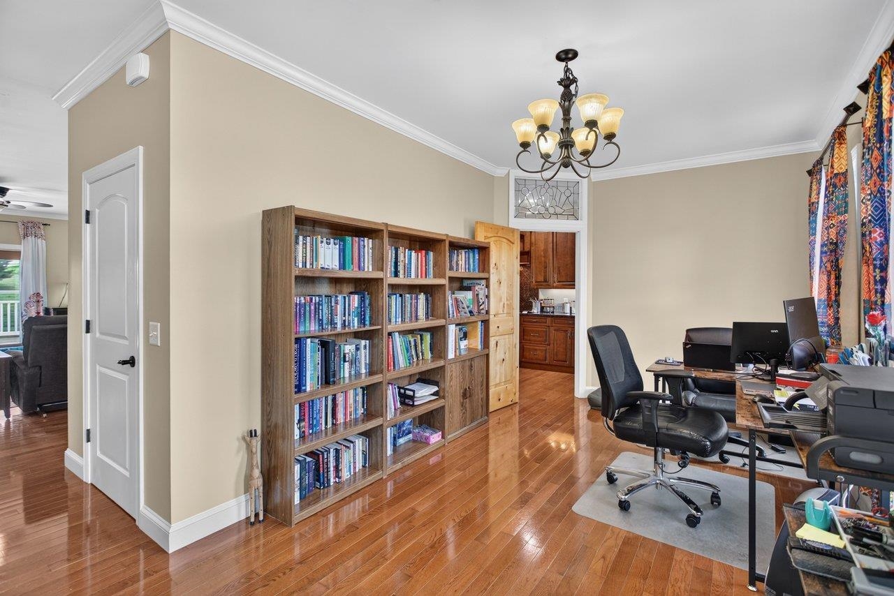 *open to informal dining area and kitchen *hardwood floors