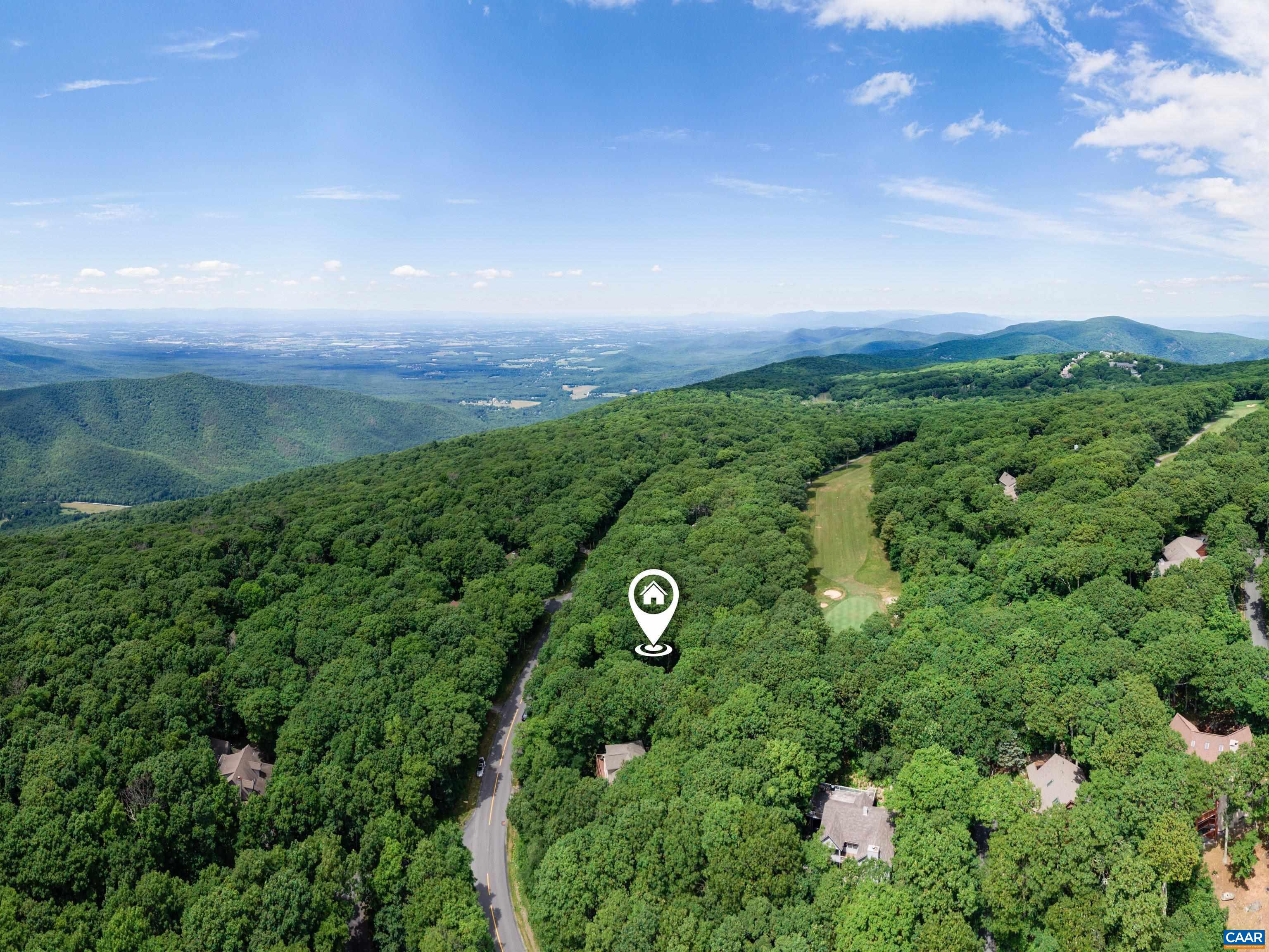 View above home and golf course from drone View above home and golf course from drone