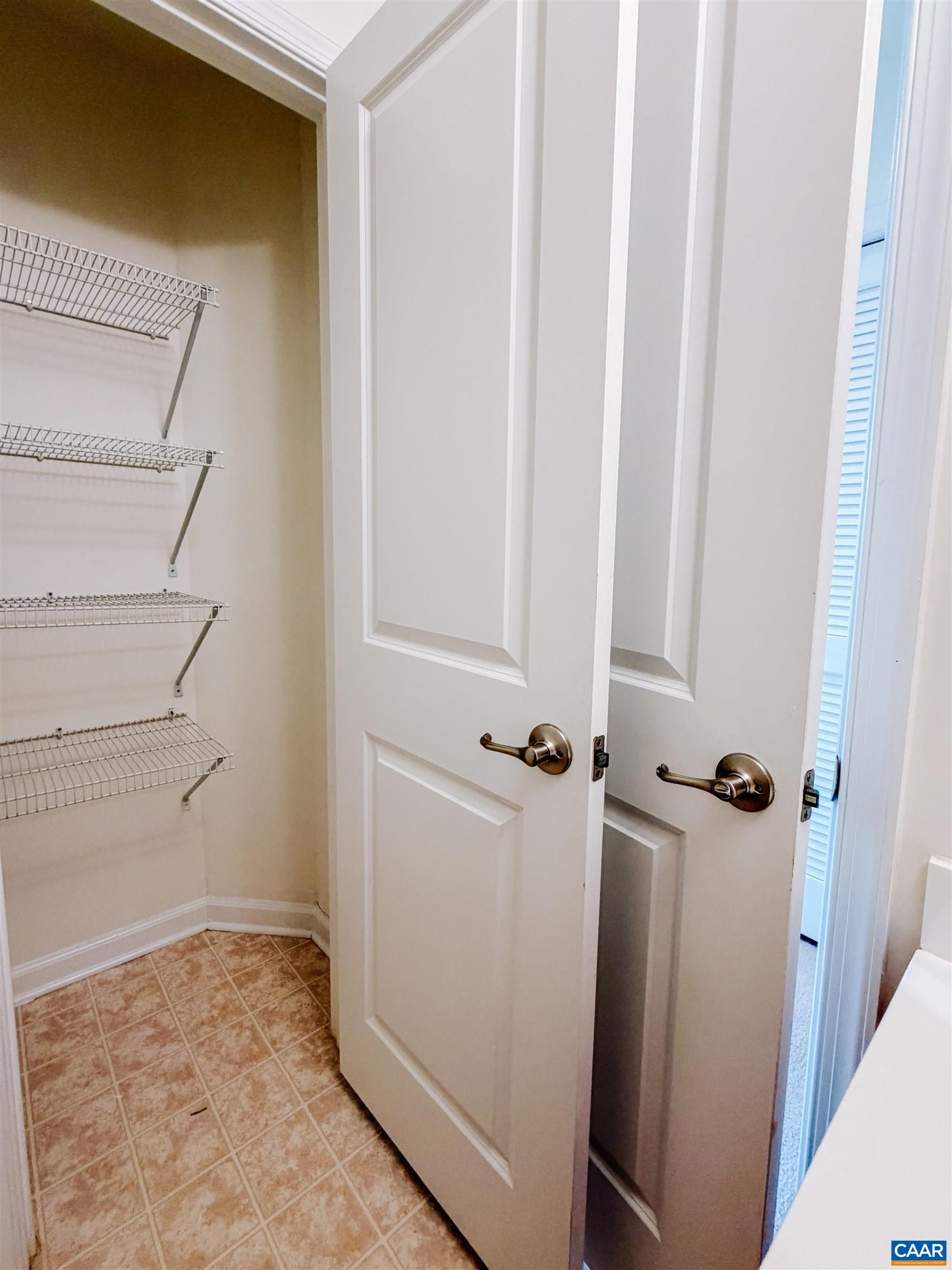 Linen closet in hall bath