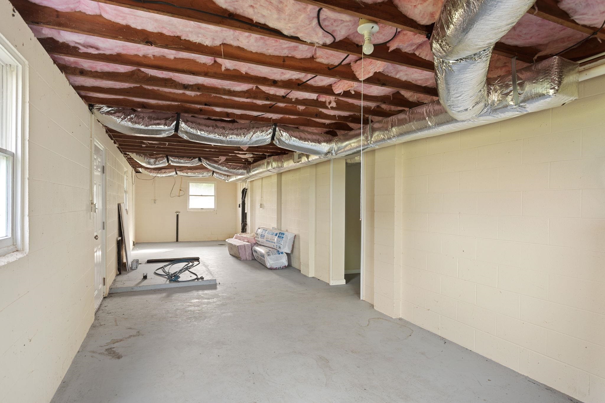 space for washer/dryer hook-up. Left is back area that can be finished.