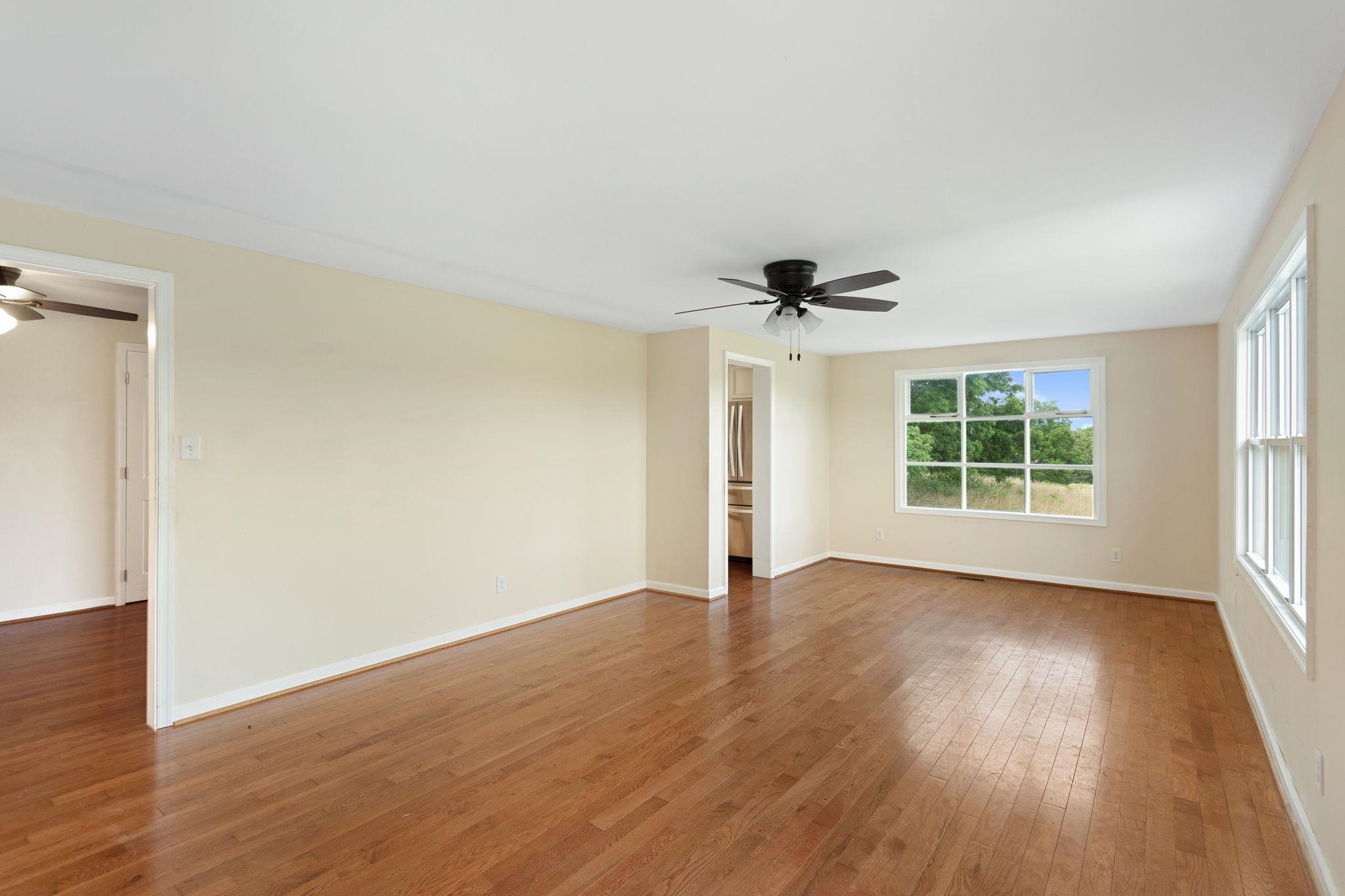 with access to kitchen and dining area.  Ample natural light.