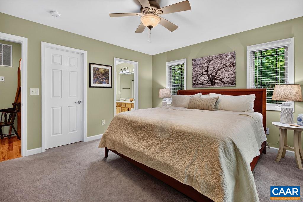 The primary suite features a walk-in closet and its own access to the expansive deck. The primary suite features a walk-in closet and its own access to the expansive deck.